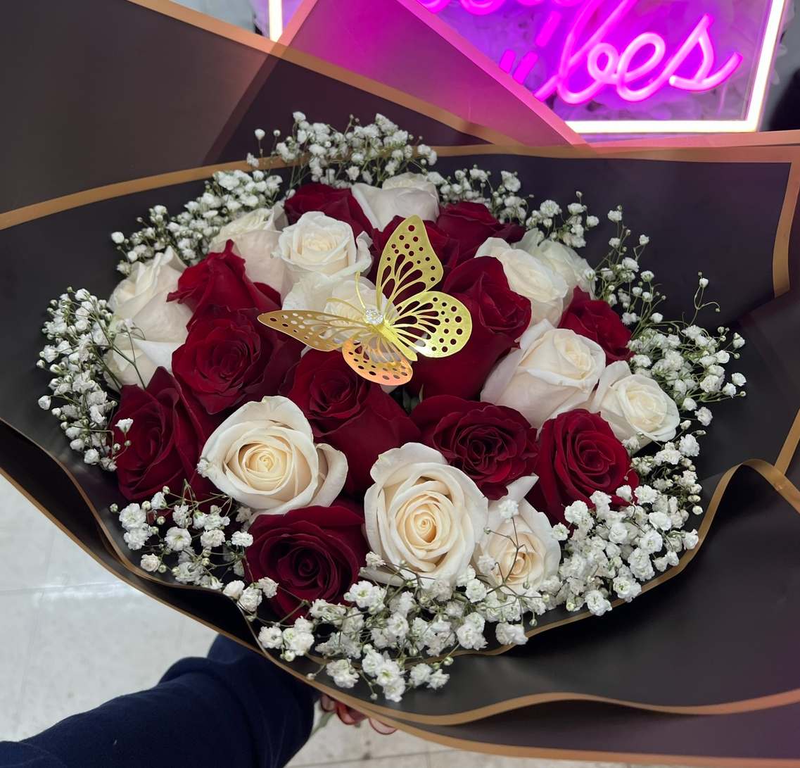 roses red and white with babies breath  - Standard :25 roses bouquet with babies breath  Deluxe 36  Premium 50 