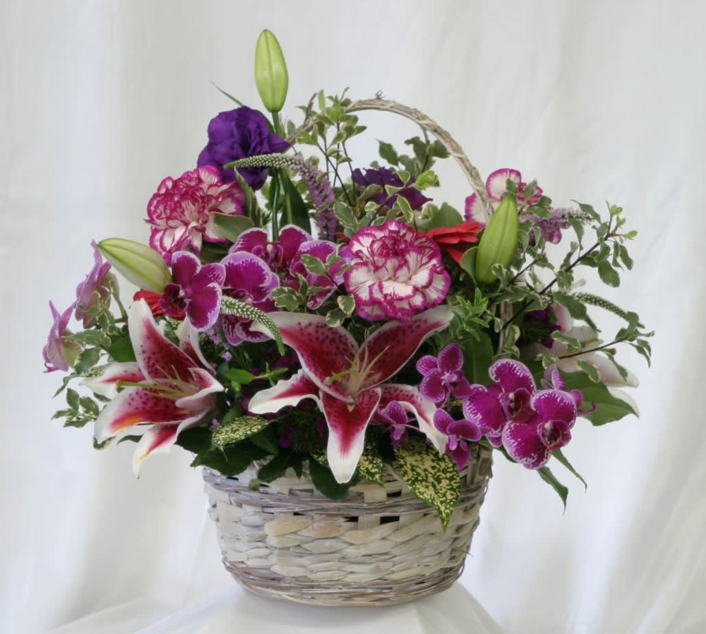 SM-25 - Stargazer lilies, Orchids, Carnations, Lisianthus and more in a basket