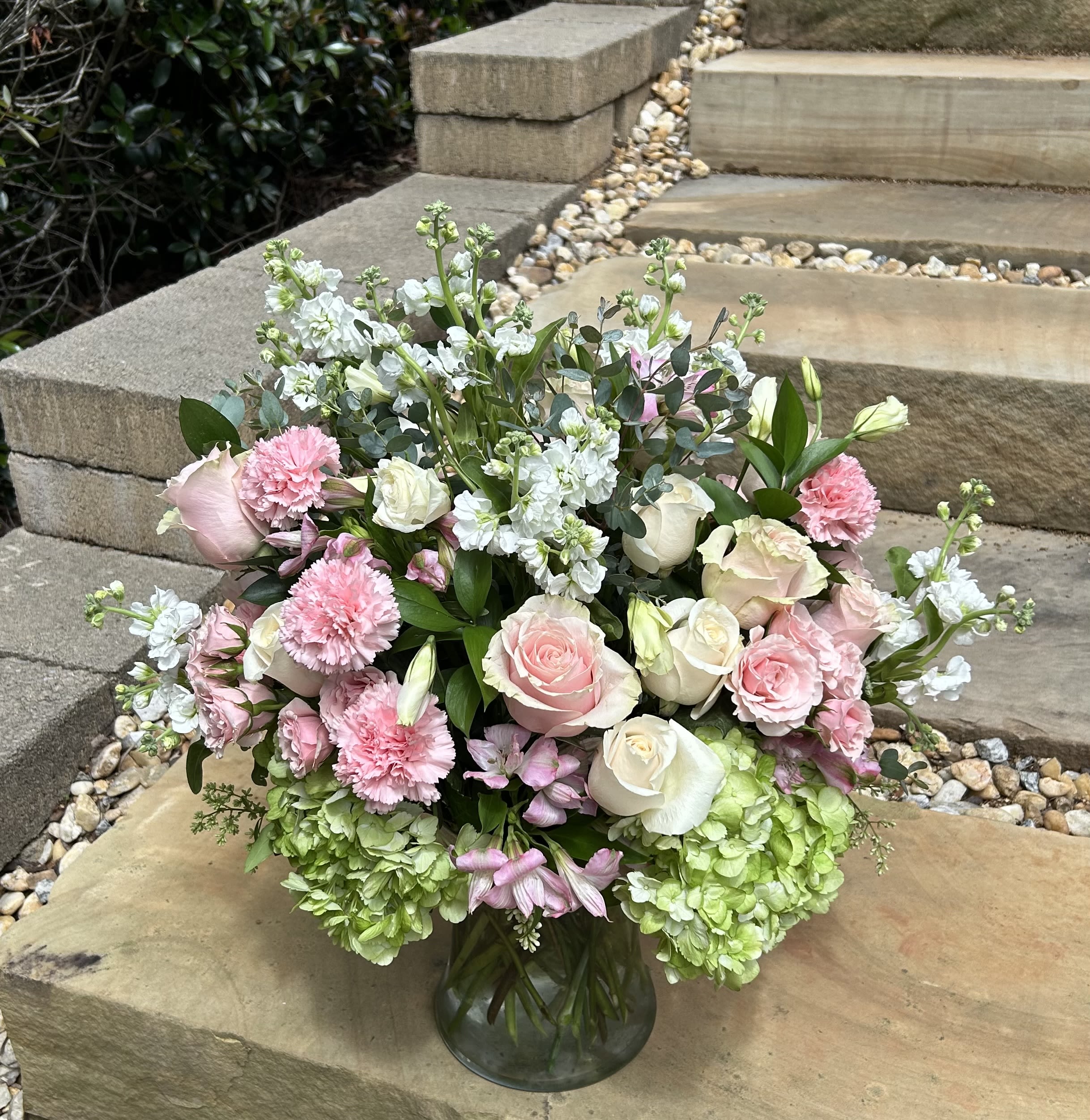 Sweet Serenity - A grand bouquet of green hydrangeas, pink roses, carnations, alstroemerias, spray roses and white stock with luscious greens to send on special occasions! 