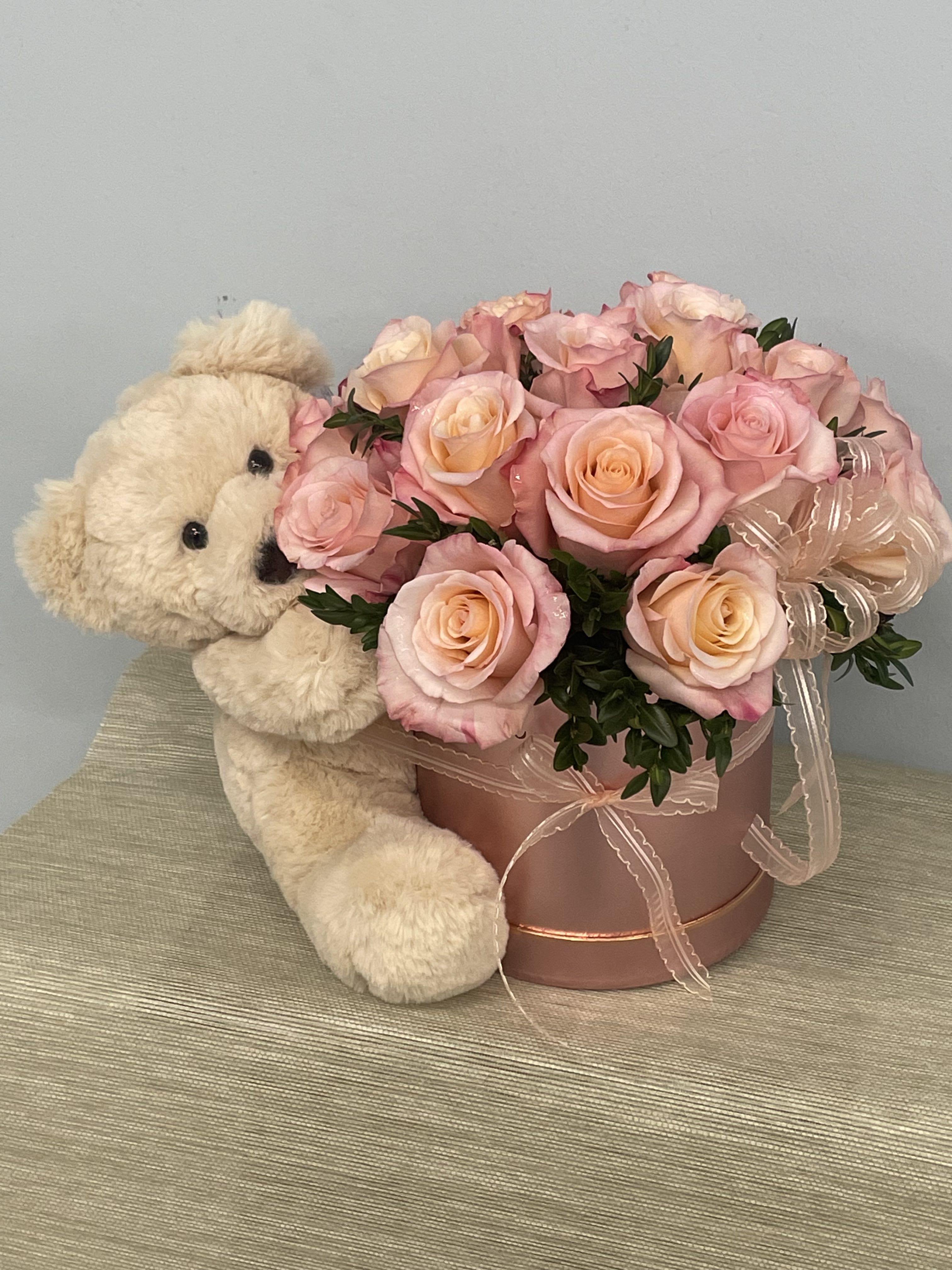 Sweet Blushes Sweet Blushes - A pink arrangement that says “I love you” without being red. A grand gesture of love and affection for her but in pink! Attention: The arrangement does come with the bear as seen on the photo. The photo displays standard.