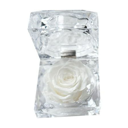 Mini Preserved Rose White Mini Preserved Rose White - Beautiful preserved mini Real Rose in a delicate clear ring box. Dimensions: 1.75"D x 1.75"W x 1.88" H