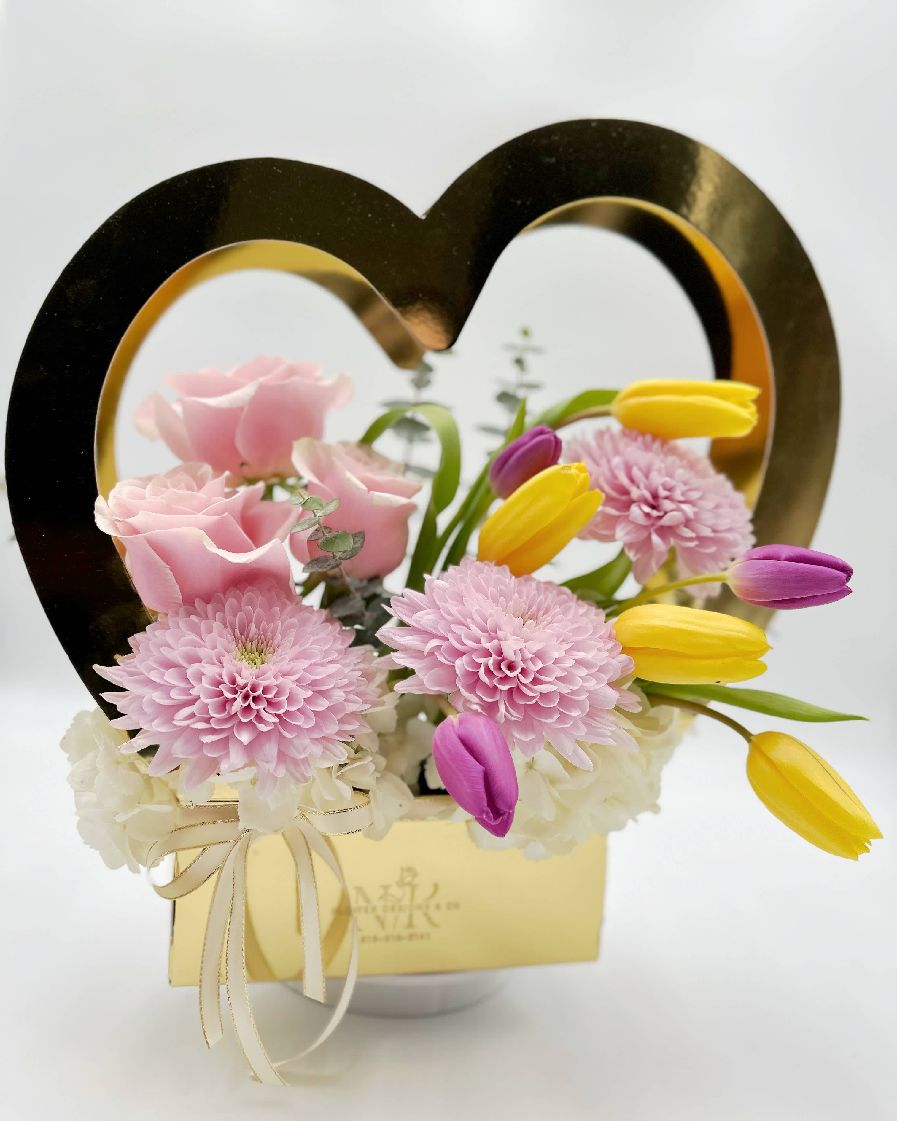 Valentine's Heart - It is not always about the quantity! This tasteful flower combination can be used for many occasions. Other color choices are also available!