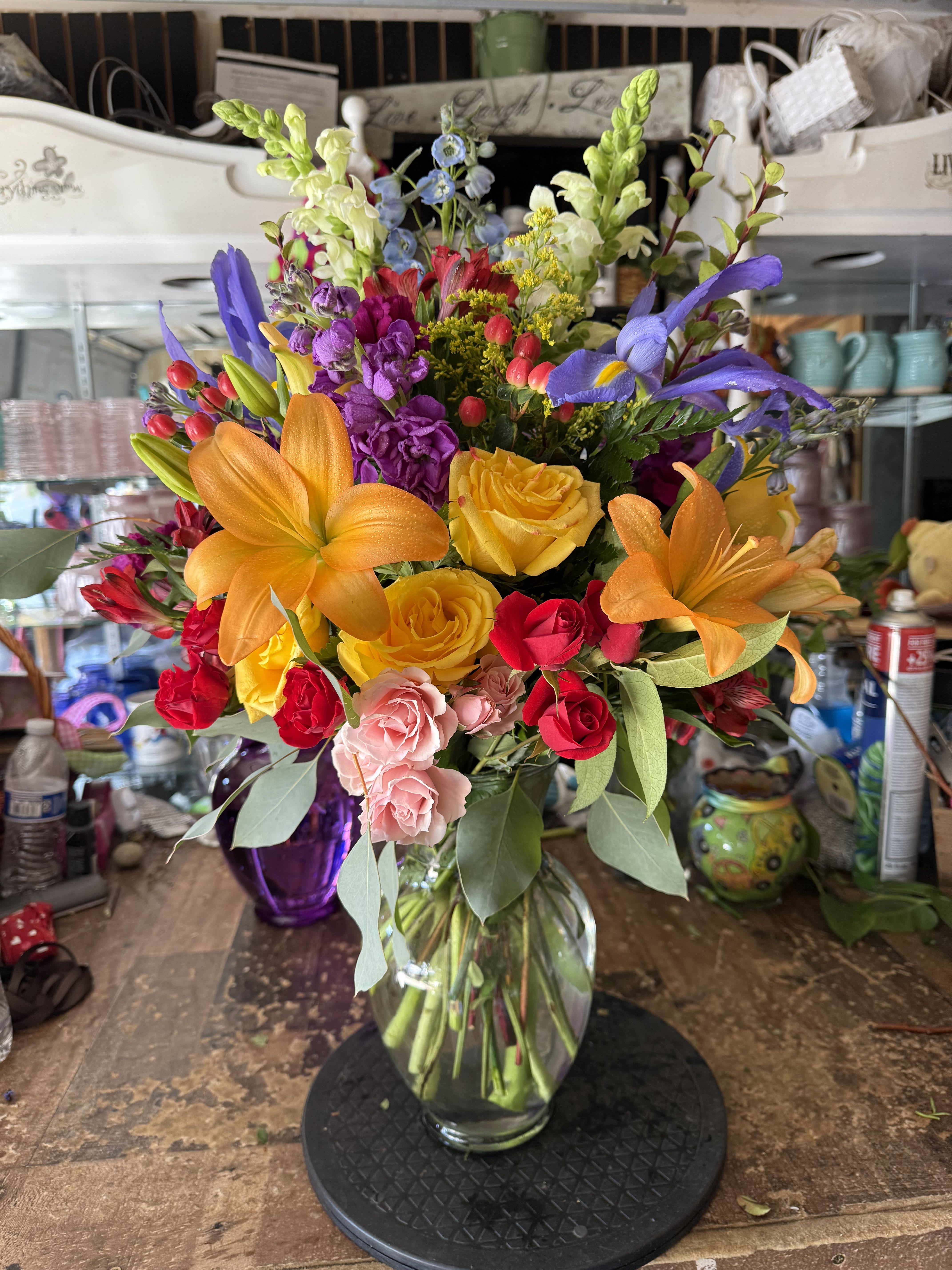 mix splendor - lilys,iris,snaps dragons,purple stock,yellow roses, spray hot pink roses