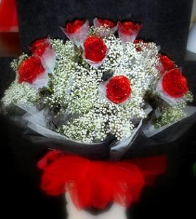 Hong Kong Style Roses - Red, Black, &amp; White - Hong Kong style red, black, and white roses HKSR-003 1/2 Dozen $150 1 Dozen $220 2 Dozen $430 Prices above include vase.   *** GRADUATION HONG KONG STYLE ROSES, PLEASE PHONE-IN  Hong Kong Style Roses WRAPPED ( without a vase) will come with water tubes/water pouch.   Recommended for graduations!  Additional $20    