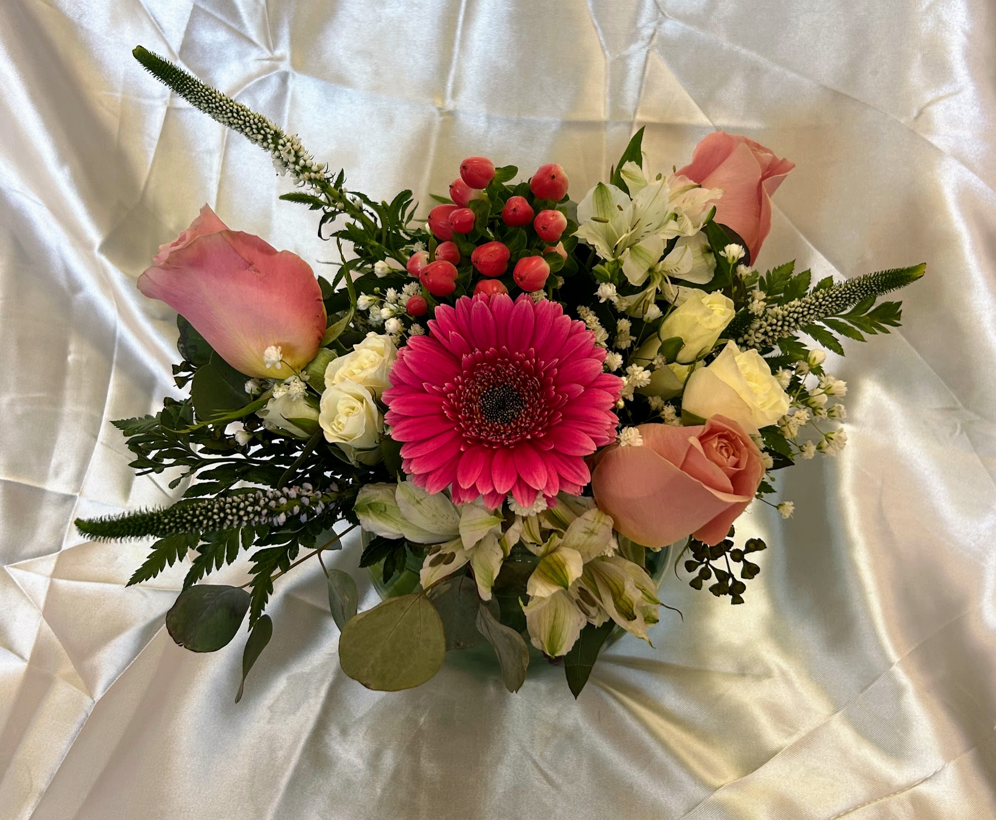 Little and Pretty Little and Pretty - Beautiful arrangement of pinks, cremes and greens. Roses, gerbera daisies, Peruvian lilies, veronica, hypericum and greens.