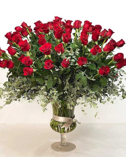 Ultimate Love Roses - When a dozen roses just won't cut it, why not send 75 red roses in a beautiful glass urn. This is the best of the best of our roses! If another color is preferred - add 1st and 2nd choice in special instructions. Options: Yellow, Pink, White, Orange. Due to the size of this arrangement 2 business days are needed from order to delivery. If required soon, call the store directly.  All prices in USD ($)