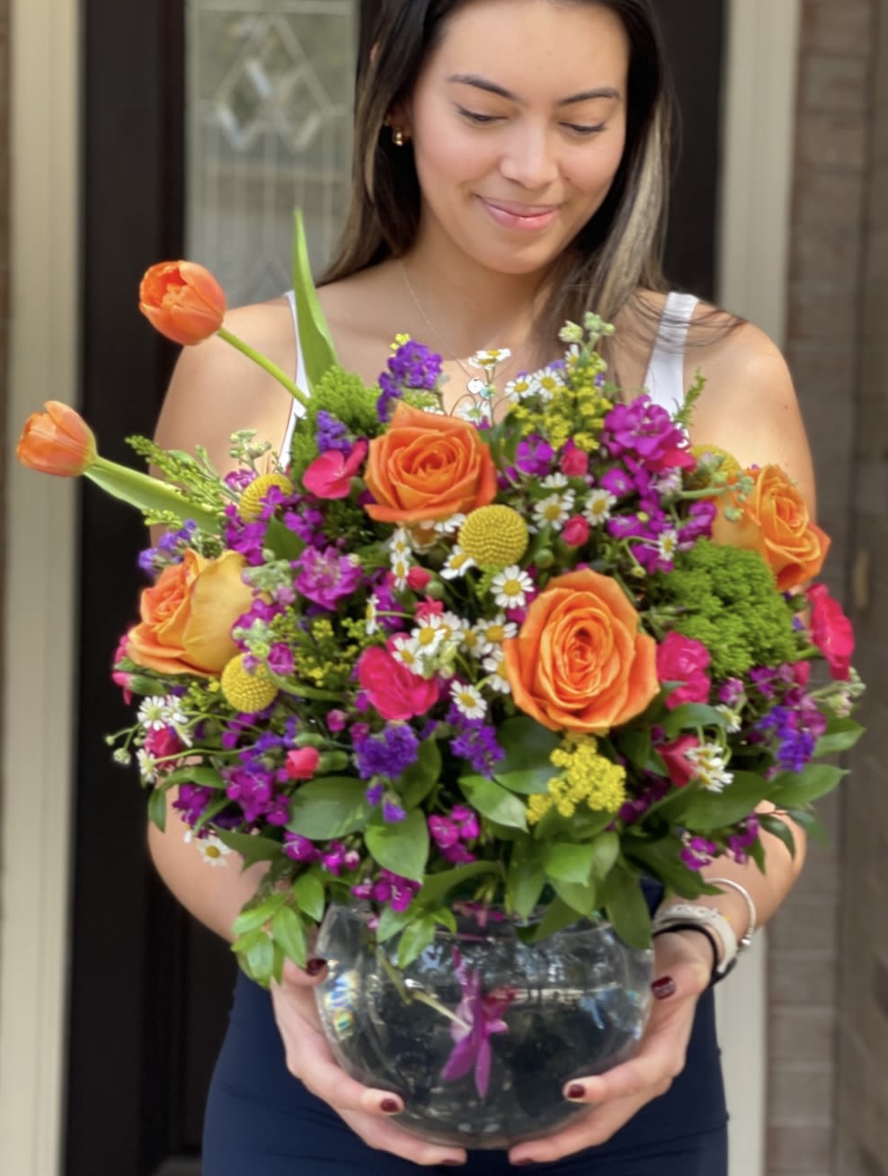 Antonia Bowl Florist choice colors Antonia Bowl Florist choice colors - Glass bowl with submerged orchids and a full of flowers and foliage. Colors may change according with the availability