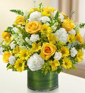 Cherished Memories - Yellow & White Cherished Memories - Yellow & White - Honor the memory of a loved one with a sympathy arrangement for the home or service. A vivid yellow and white bouquet of roses, snapdragons, alstroemeria, carnations and more is arranged in a classic cylinder vase to pay tribute to a beautiful life.