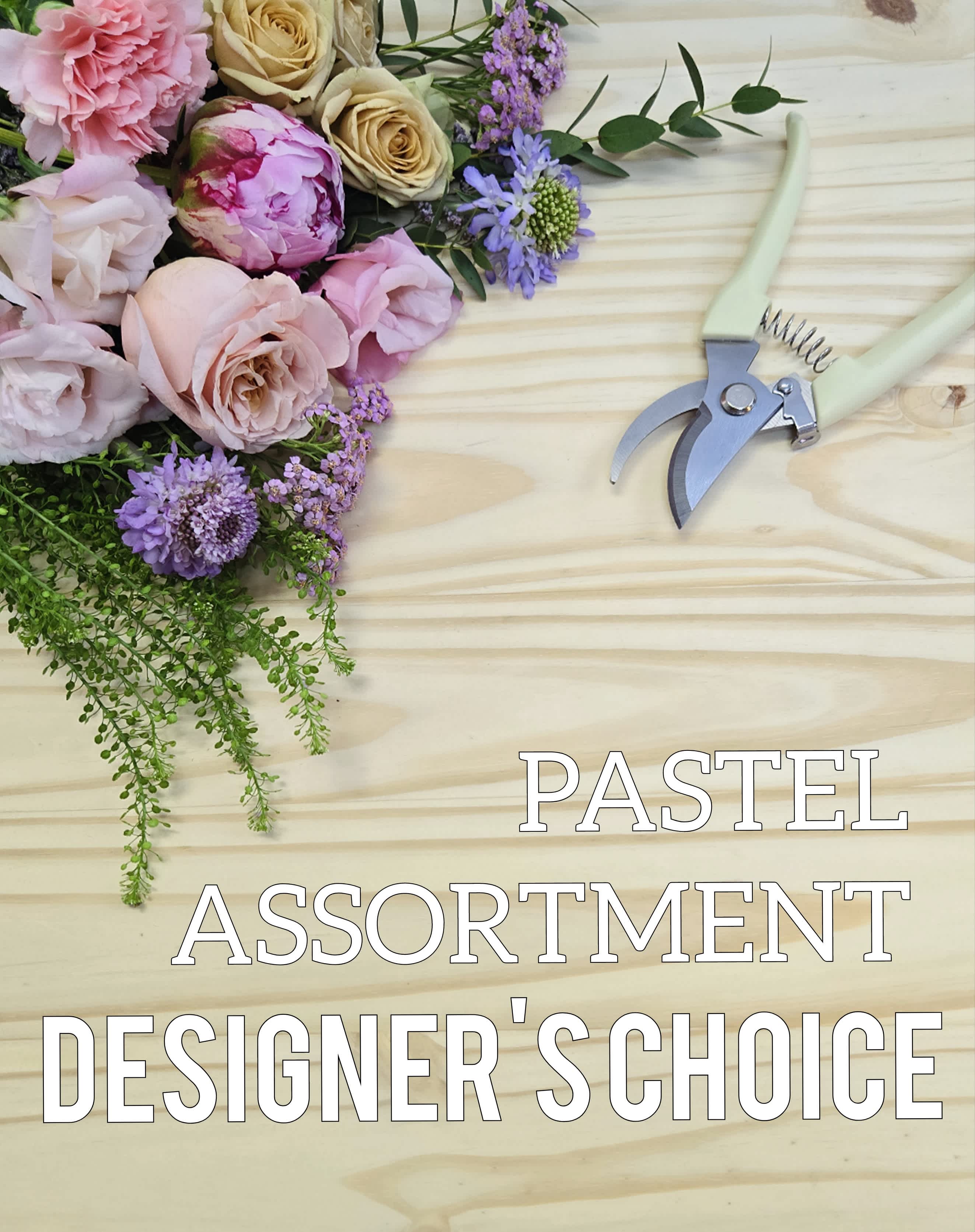 Pastel Assortment DESIGNER'S CHOICE Pastel Assortment DESIGNER'S CHOICE - Let our designer's create a beautiful one of a kind fresh Flower arrangement. We will hand select from our daily seasonal fresh flower. This allows our Floral Designer's to create the most beautiful one of a kind Perfect for any occasion using our freshest flowers brought in daily. The arrangement will be designed in a container of designers choice. ***THIS SELECTION IS ASSORTED PASTEL/SOFTER COLORED FLOWERS. NOT NECCESSARILY THE FLOWERS SHOWN IN PHOTO. This is just a color palette selection. Flowers will be chosen by floral designer appropriate for the current time of year.