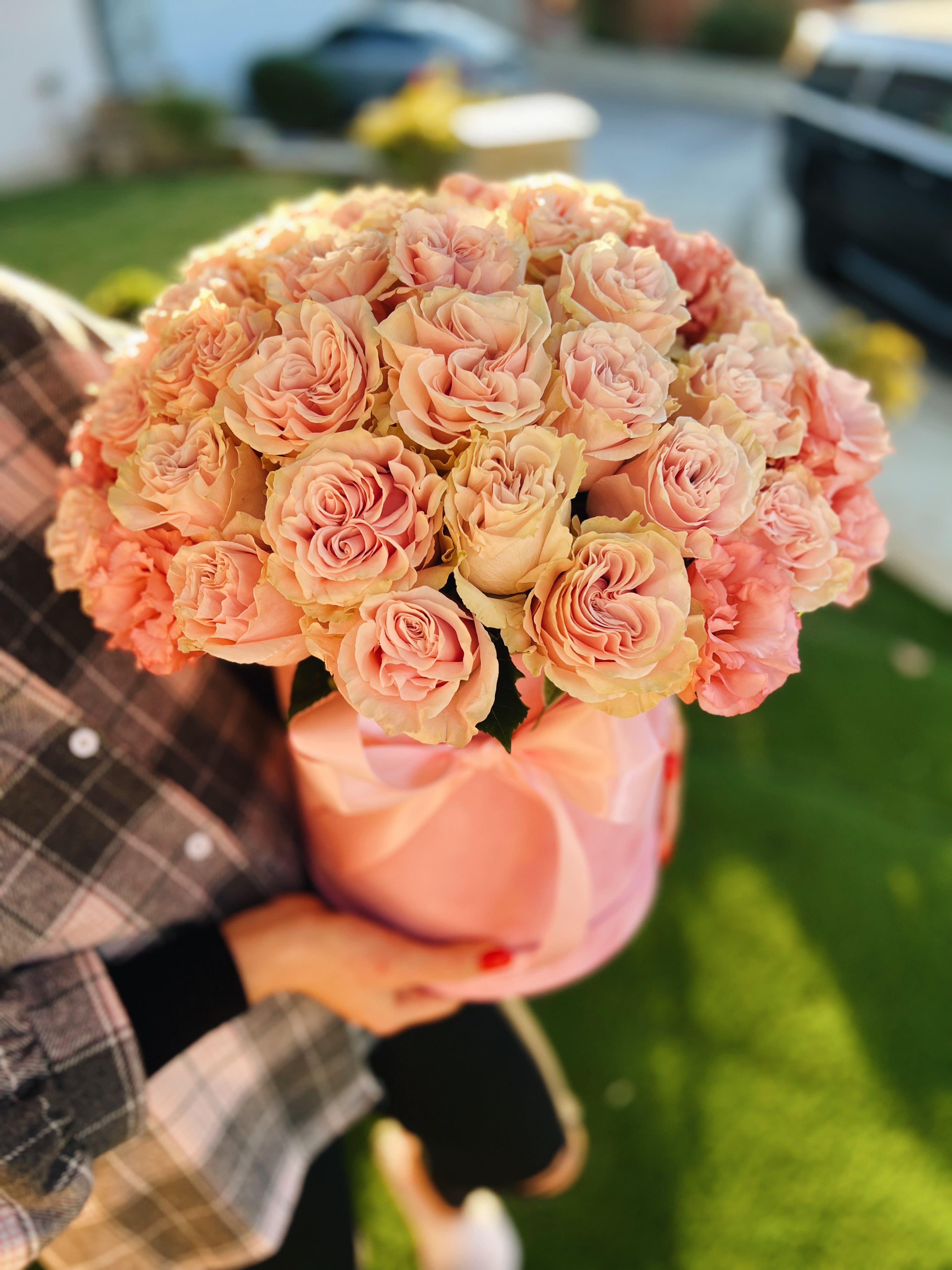 Secret confessions - A Box of Soft Pink Ruffled Roses — a true embodiment of elegance and romance. With their lush, ruffled petals, these roses seem crafted by nature to express tenderness and warmth. Their delicate pink hue evokes feelings of first love, lightness, and the gentle glow of a summer morning.  Arranged in a graceful box, these roses are more than just flowers — they’re a heartfelt gift and a beautiful addition to any space. No words needed — simply beautiful. The standard size is 55 roses. Deluxe size 75 roses. Premium size 95 roses.
