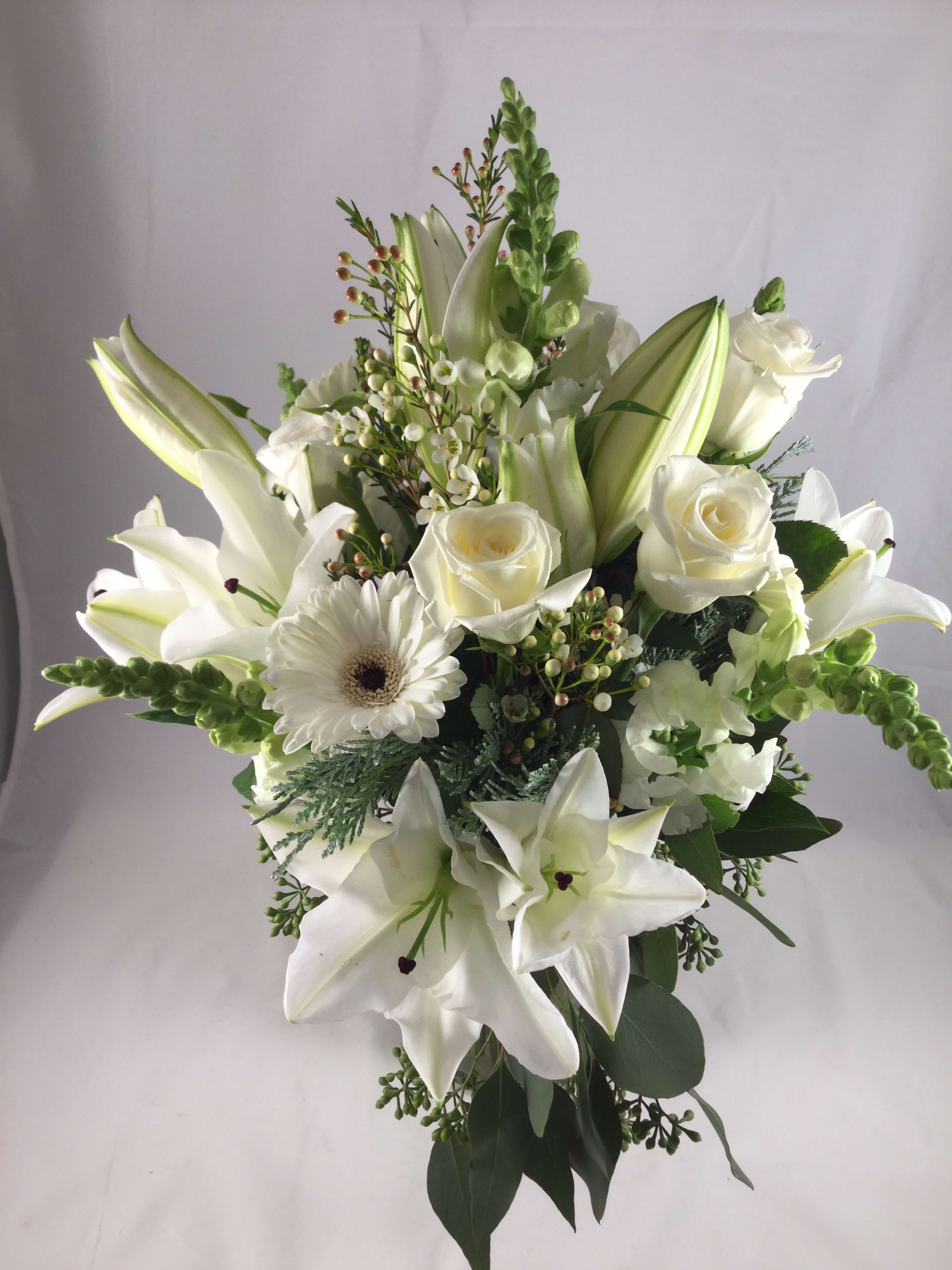  Rhapsody in White - An elegant bouquet of all white flowers