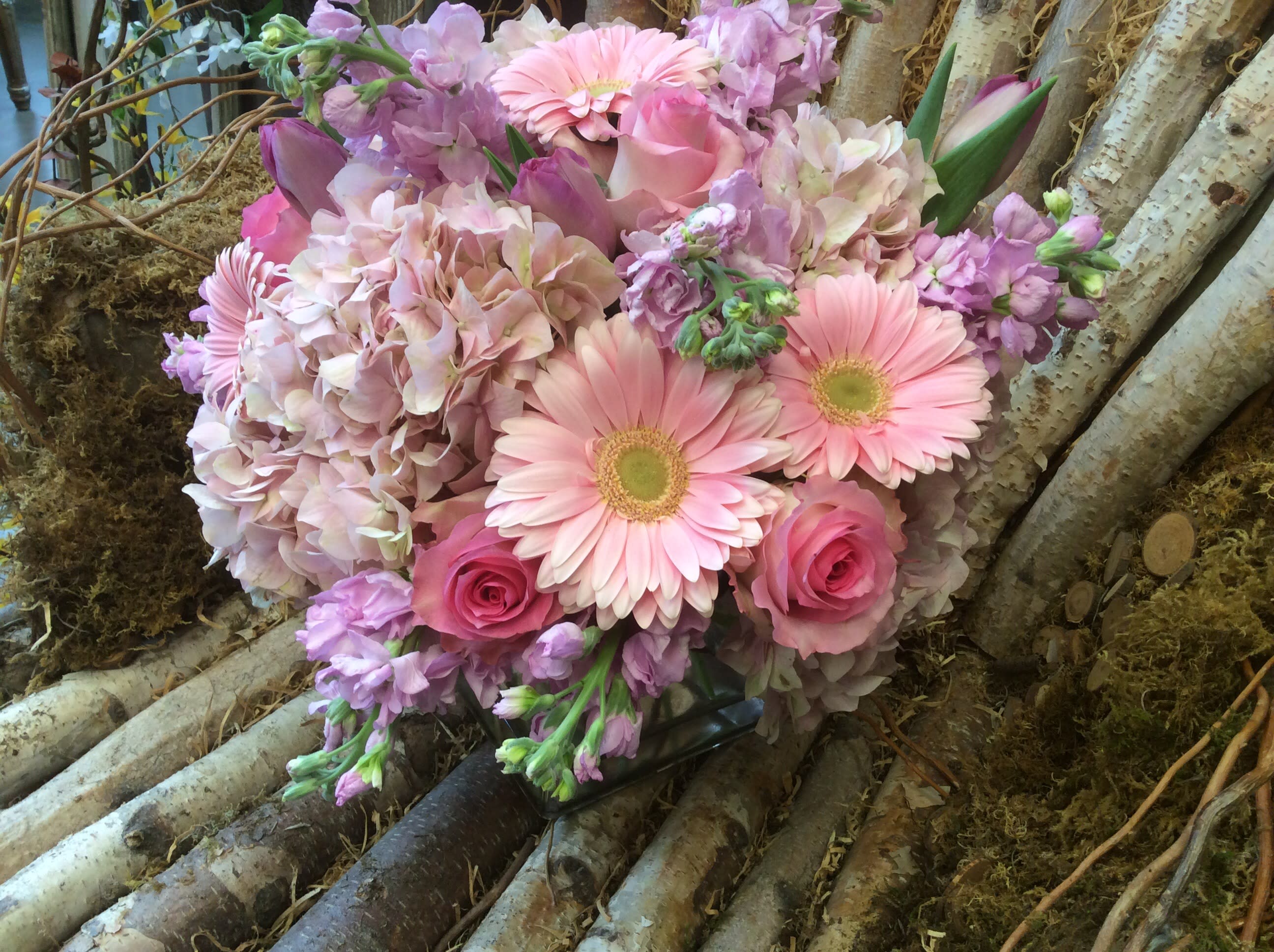  Pretty pastels  -  This arrangement is uniquely designed using pastel colored botanicals.