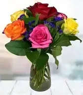 6 Assorted roses in glass vase 6 Assorted roses in glass vase - mix colors of premium roses with baby breath and greenery