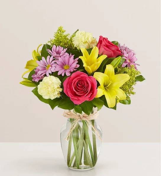 Fields of Europe® for Mom - Mom is in for a beautiful surprise! Our best-selling Mother’s Day arrangement is designed in the same tradition as the hand-tied bouquets found in European flower markets. A vibrant mix of blooms inside a glass vase tied with raffia, it’s a gift that delights with old-world charm and style. 