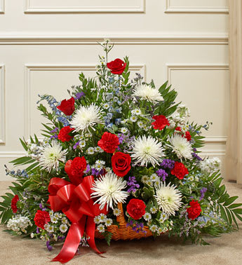Thoughts and Prayer Fireside Basket-Red/White/Blue - Product ID: 91202   This beautiful arrangement is the perfect tribute for a beloved veteran. Red roses, white mums, blue delphiniums and more are arranged by our expert floral designers Traditionally sent by family, friends or business associates Delivered directly to the funeral home Due to the sensitivity of the occasion, our florists use only the freshest flowers available so varieties and colors may vary Measures approximately 24âH x 30âL