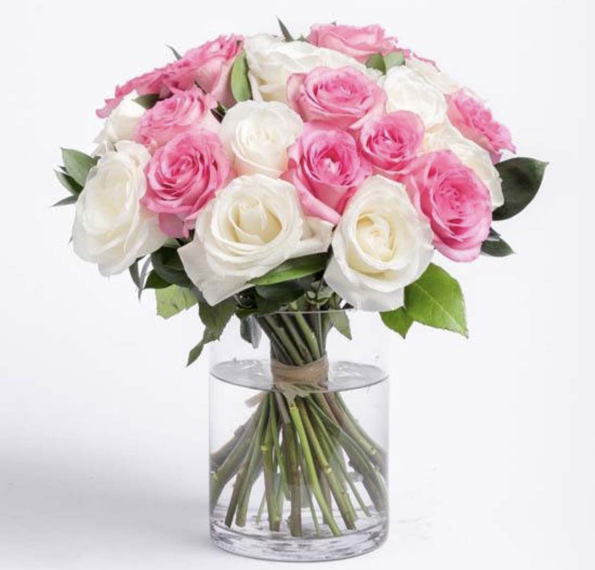 Blooms of Roses Blooms of Roses - Delicate and timeless, our Pink and White Rose Bouquet is a symphony of romance and purity. Soft pink and pristine white roses come together to create a classic and elegant arrangement. Perfect for any occasion, these roses are a sweet expression of love, appreciation, or celebration, bringing beauty and grace to every moment.