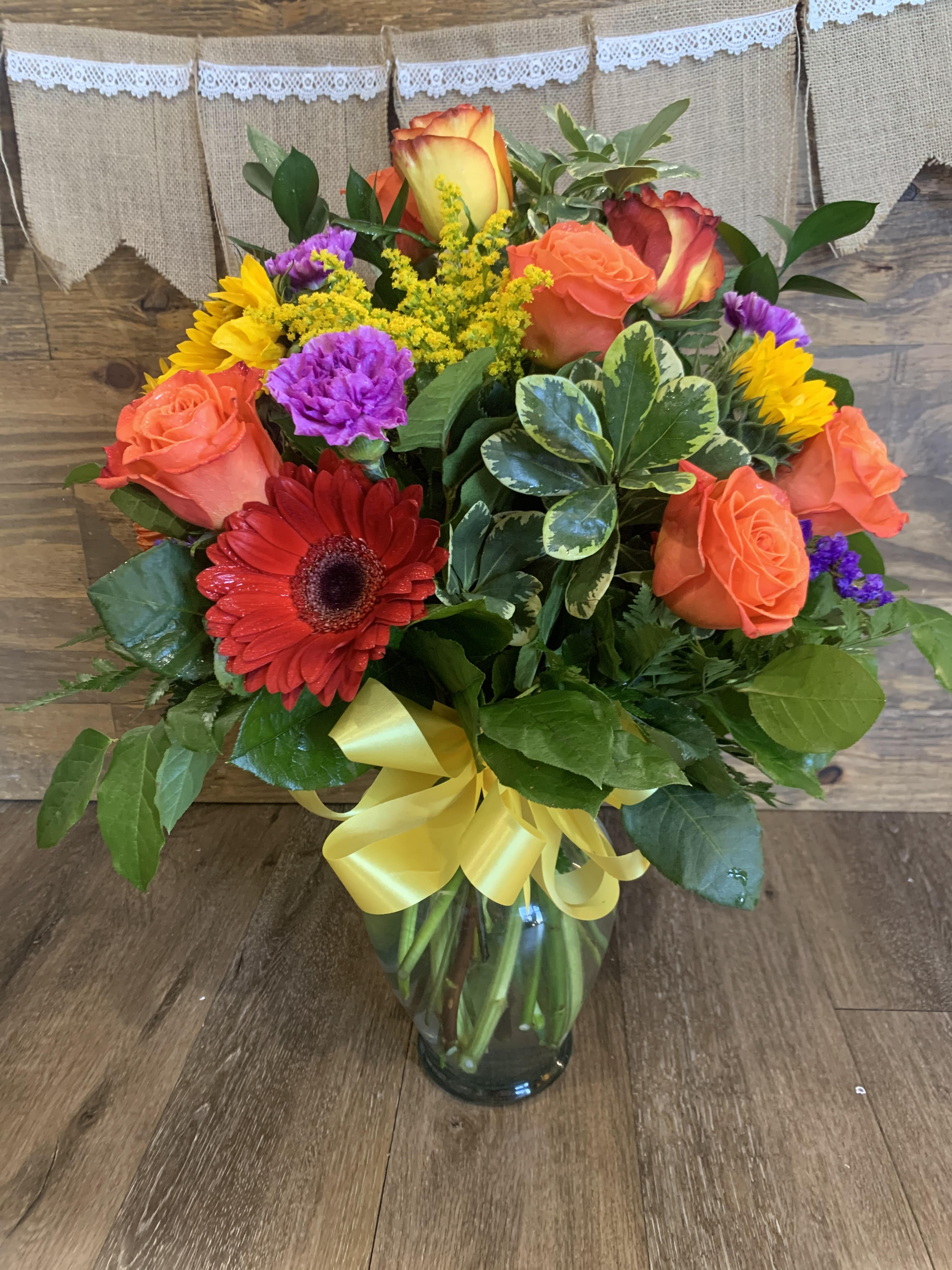 Brighter Days  - Brighten up their day with this &quot;Brighter Days&quot; arrangement! Full of Sunflowers, Roses, Carnations, Gerbera Daisies and more with a variety of beautiful and luscious greens! 