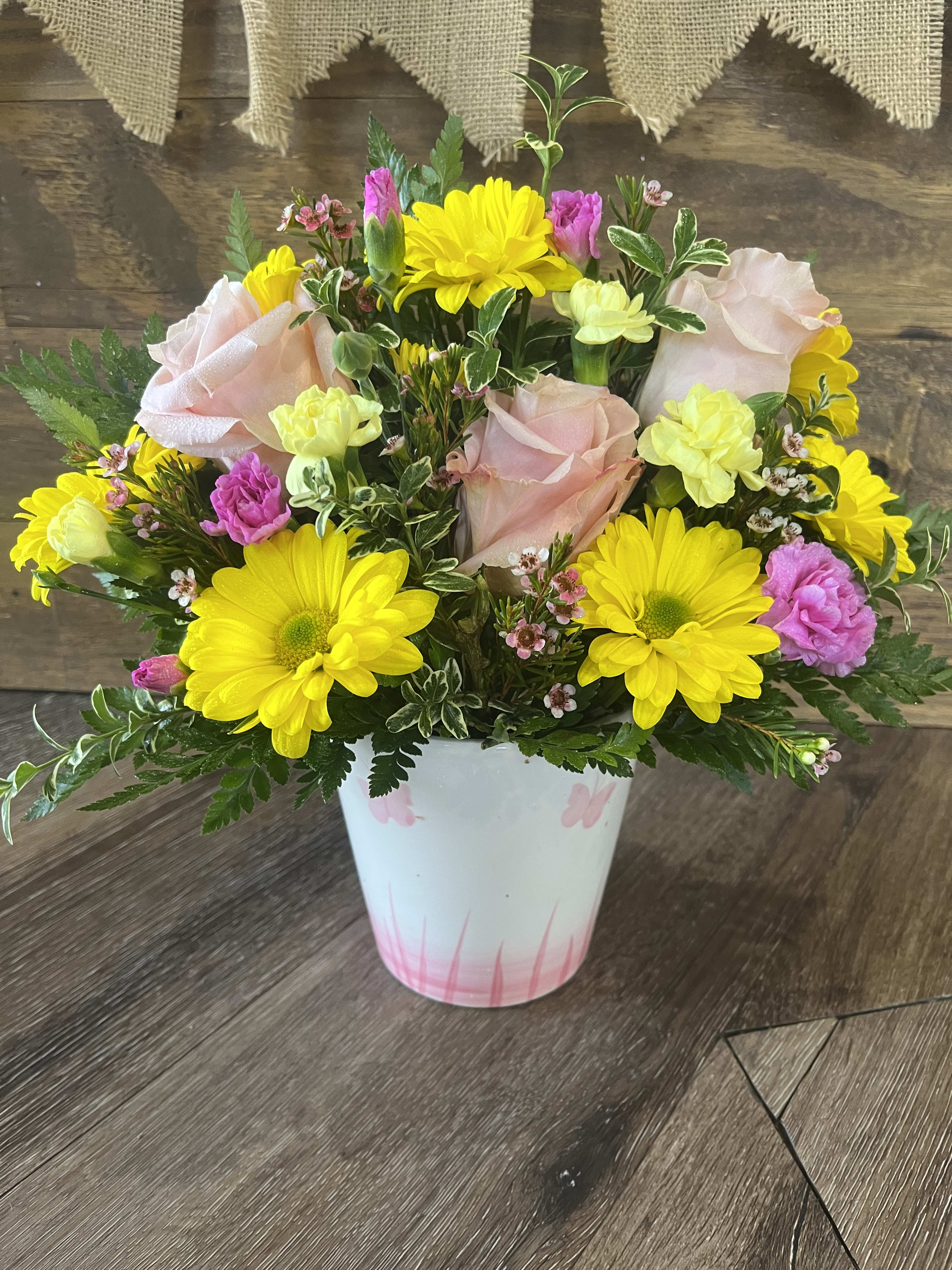 Butterfly Spring  - This adorable butterfly ceramic container is filled with Roses, Daises, mini Carnations and Wax Flower!  **container color varies, yellow, pink or orange”  