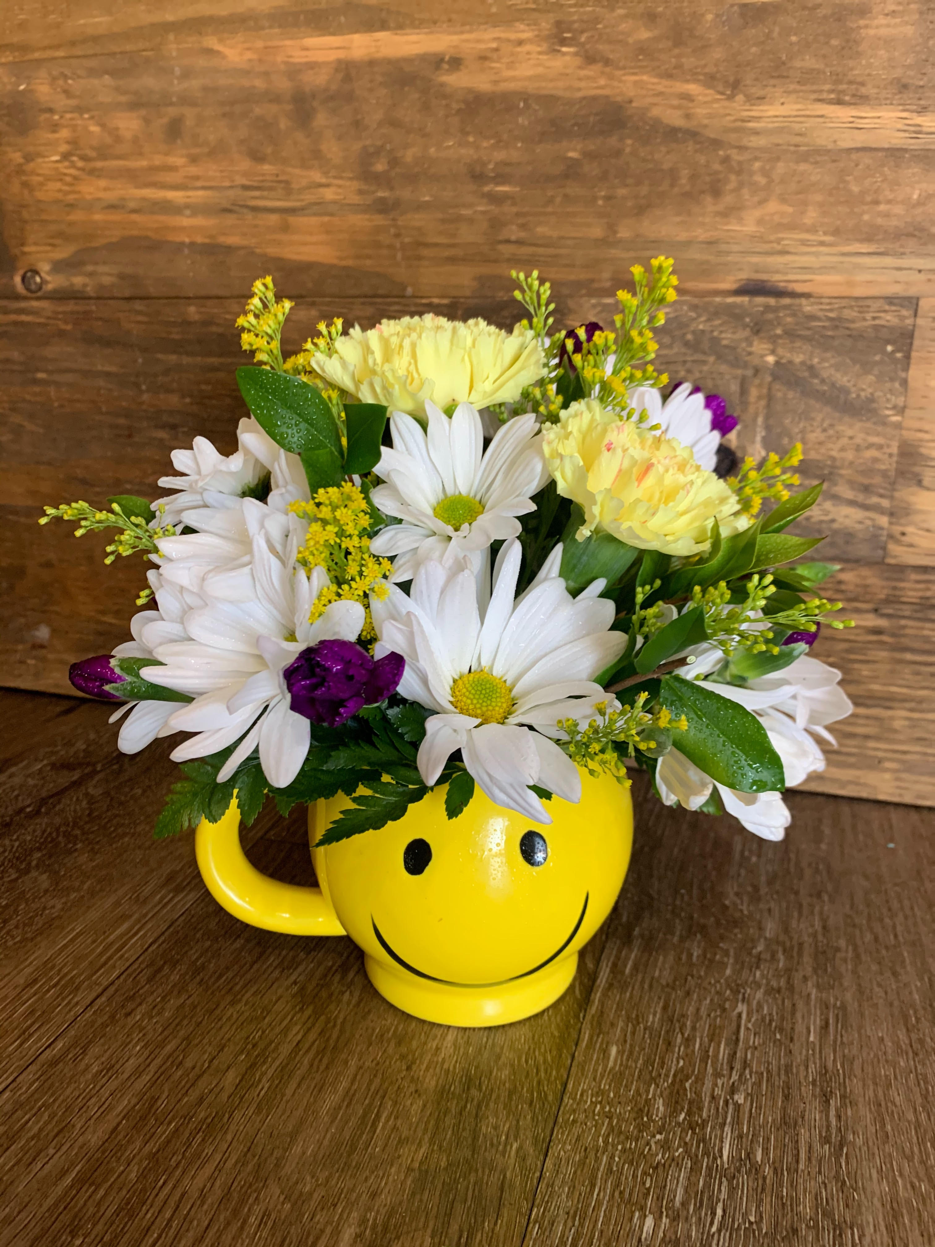 Don't Worry, Just Be Happy!  - This adorable smiley face is sure to bring a Smile to anyone! Filled with Carnations, Daisies and more! 
