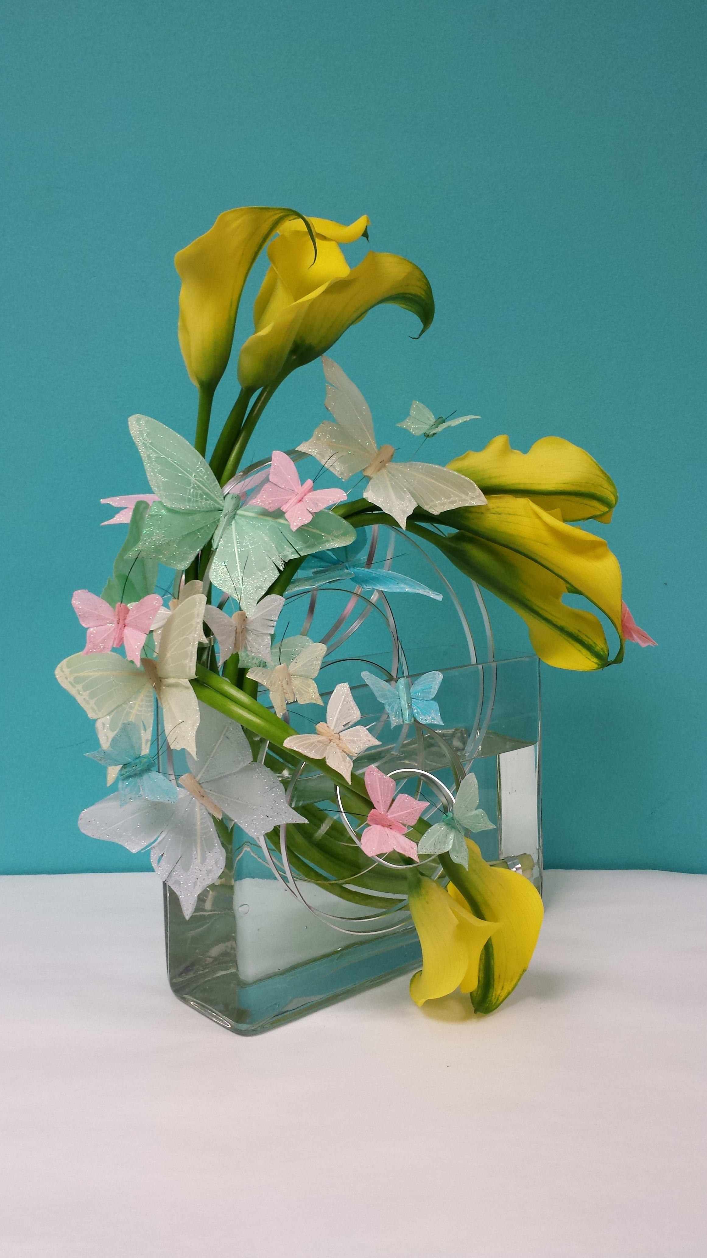 Butterfly Garden  - Callas in a square clear vase with butterflies.  There is a window off 24 hours to fulfill these order  