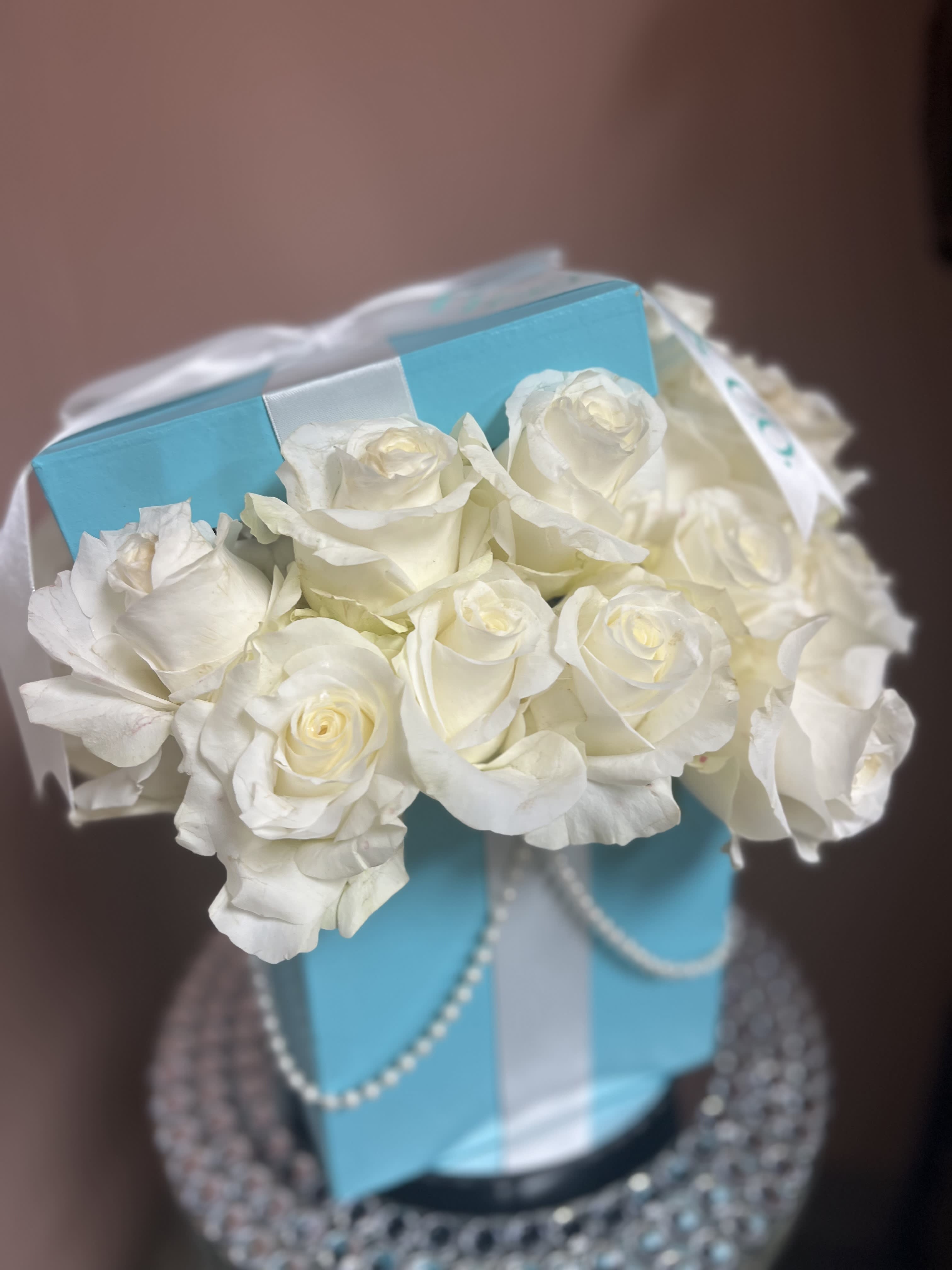&quot;What a Girl Want&quot; 24 White Rose &quot;Tiffany&quot; Inspired Elegant Gift Box with Lid (Black Box Option available) - XL Box of   24 Pure White Large Bloom Premium Roses  placed in an  Elegantly &quot;Tiffany Blue&quot; decorative Gift Box adored with Satin White Ribbon and Faux Pearls (also available in Black Box option) .  Includes foamed plant food preservative water sourced for extended life with card 