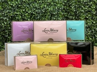 LOUIS SHERRY PREMIUM CHOCOLATE  - Our emblematic gift box is composed of a house selection of exquisite Louis Sherry truffles renown for their creamy texture and exceptional silkiness.  A truly delightful gift for anyone to indulge in the pleasure of fine chocolate.  The gift box comes cellophane wrapped with a matching bow. Photo shown is the standard and deluxe sizes. 