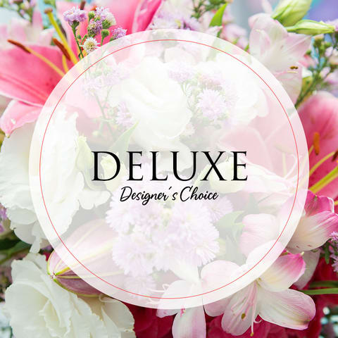Deluxe Designer's Choice - Designer selects flowers that are available and can choose to do arranged or wrapped flowers.