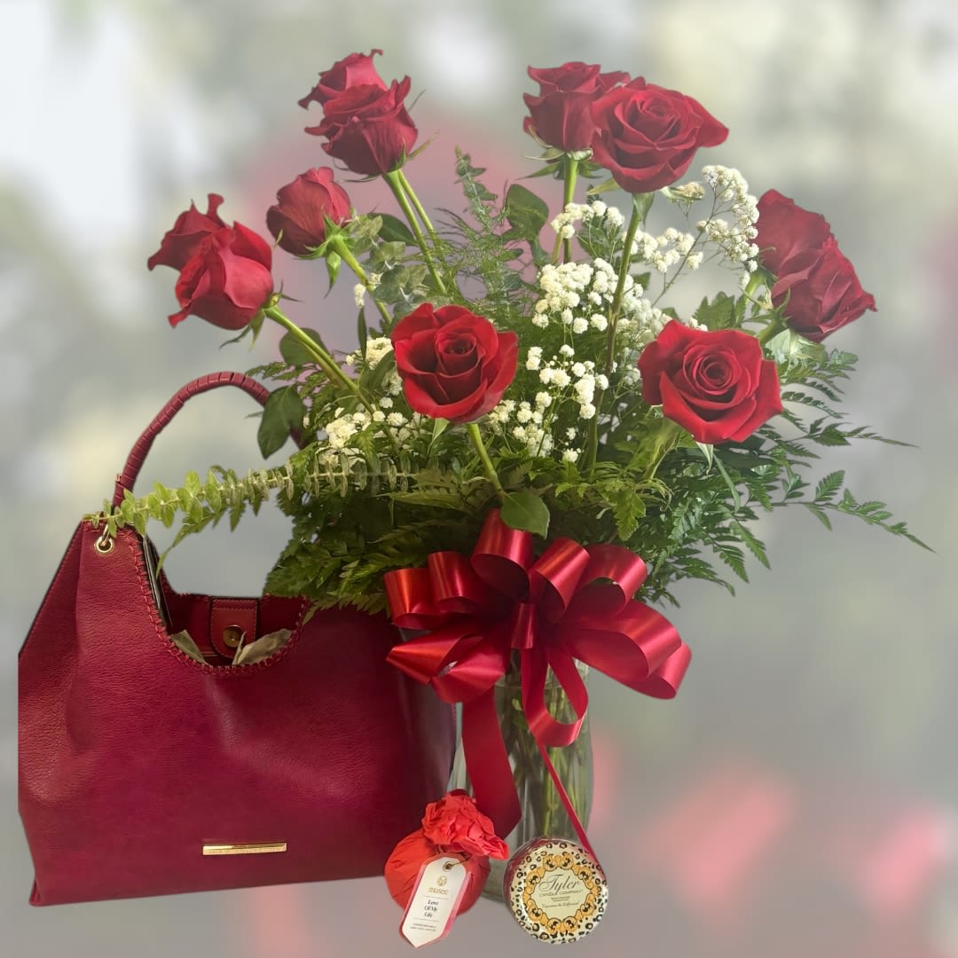Petals and Posh gift set Petals and Posh gift set - Petals and Posh gift set includes a gorgeous handbag, A dozen of red roses, a bath bomb, and a Tyler candle! (Handbag style & color will vary to make each one unique)