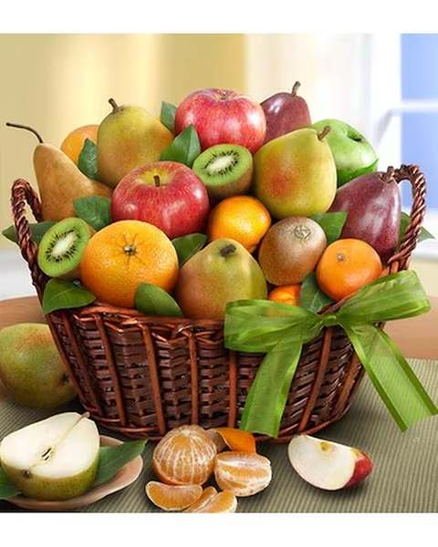 Premier Orchard Fruit Gift Basket - Send sweet sunshine their way with this hand-woven, sturdy wicker gift basket filled with an assortment of delicious hand picked fresh fruits. (Due to the unique nature and variety of selected fruits items may be substituted as needed to complete the beauty of this selection.) 
