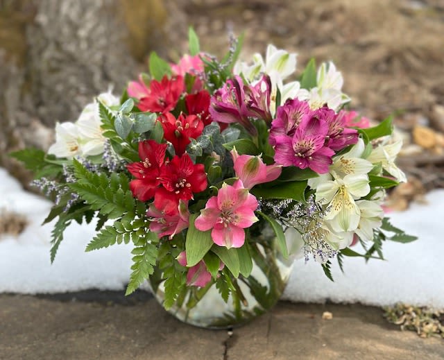 Romantic Bliss Romantic Bliss - The classic bubble bowl filled with beautiful assorted colored alstromeria.
