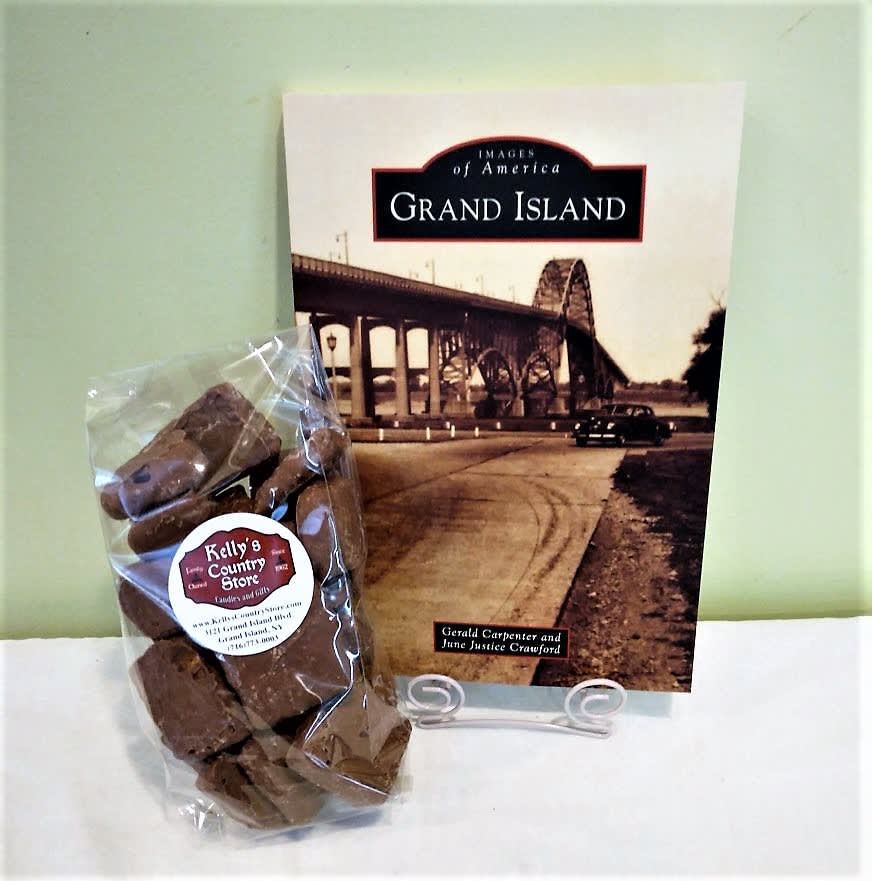 Celebrate Grand Island ~ Flower A Day Celebrate Grand Island ~ Flower A Day - "Images of America Grand Island" book and Kelly's Country Store sponge candy. The soft cover historical book is a wonderful gift for any resident of Grand Island and Kelly's sponge candy is a real treat all arriving in a gift bag. (book stand not included)