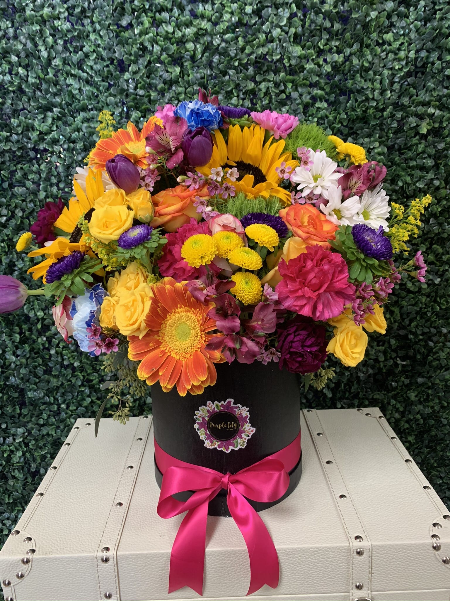 Dazzling Sunshine PLA52 - Sunflowers, roses, sray roses, mini hydangrea, alstroemerias, matsumoto and solidago arranged in a cylinder black box. Also available in white box.