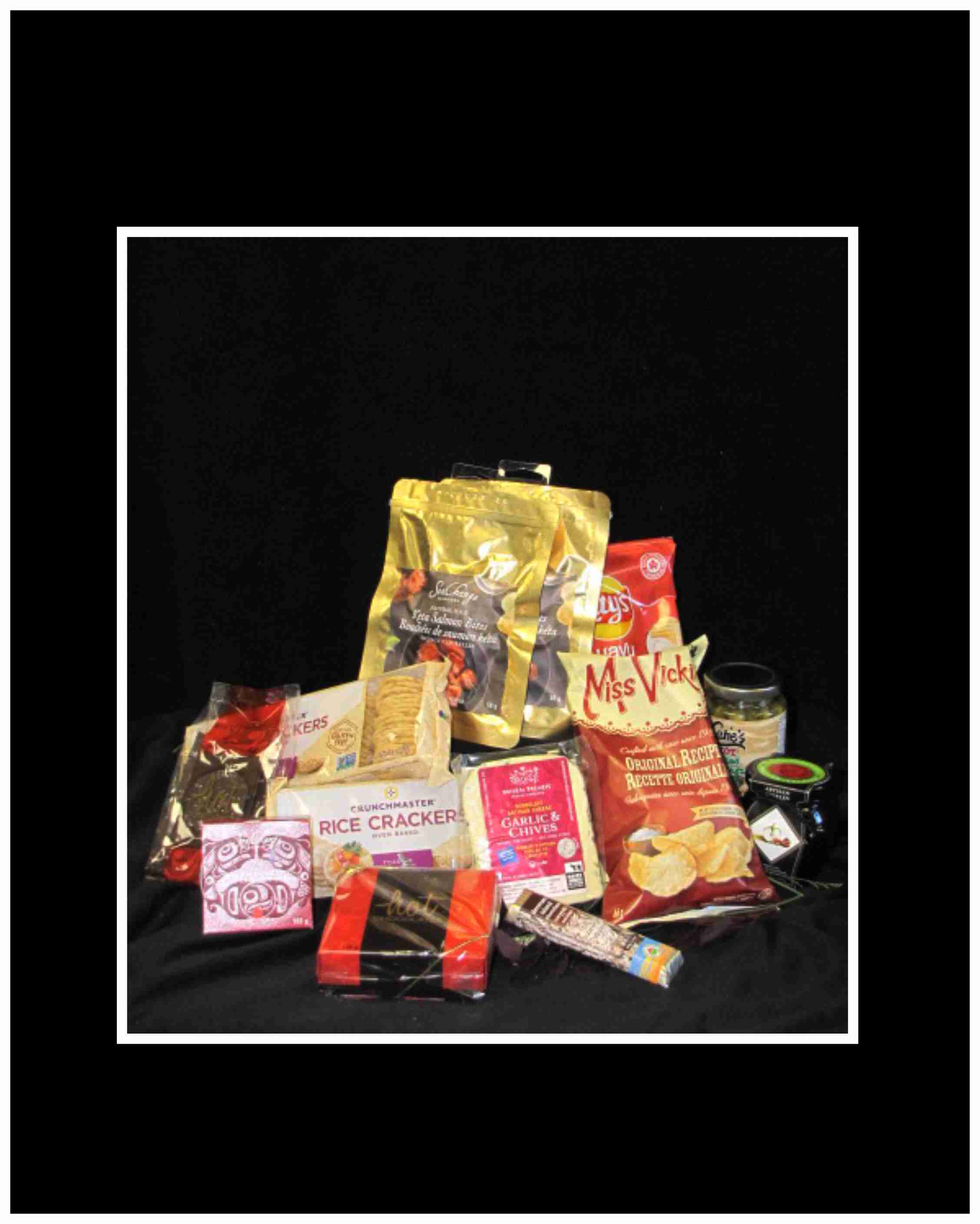 Gluten Free Gift Basket - If Gluten is a problem, not a problem all the products have been reviewed and no gluten, 2 rice crackers, 1 cheese from Courtenay, 2 keta bites crackers, 2 bags of chips, smoked salmon bites from Campbell river, chutney from artisan edibles in Parksville, 9 piece truffles, chocolate bark, from Hot chocolates in Courtenay, pickled beans or asparagus fro Katie's pickled beans, denman Island chocolate bar all wrapped and ready for gift giving.  (Working hard to promote local products)  Local delivery only