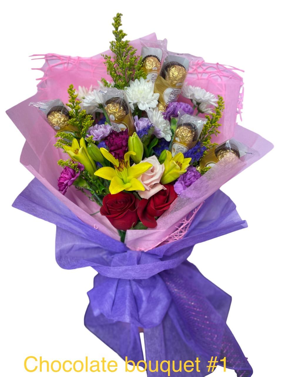 Chocolate Bouquet 020 Chocolate Bouquet 020 - In some instances, our photo may represent an overall theme or look and include a one-of-a-kind vase which cannot be exactly replicated. Although the actual bouquet may not precisely match the photo, its temperament will. Occasionally, substitutions of flowers and/or containers happen due to weather, seasonality and market conditions which may affect availability. If this is the case with the gift you’ve selected, we will ensure that the style, theme and color scheme of your arrangement is preserved and will only substitute items of equal value or higher value. If any design elements are of major importance to your order, please include them in the florist instructions at checkout or contact us to ensure availability. Flower Care & Guarantee Policy We guarantee the freshness of our flowers for 24 hours from the time they leave our shop. Please note that because flowers are natural products, some blooms may open fully while others may not. This is a natural variation. To help your flowers last longer: For cut flowers: Trim the stems by 1 inch every 2–3 days and place them in fresh water. For arrangements in wet foam: Add 1 cup of water to the foam every couple of days to keep the flowers hydrated. After 24 hours from leaving the shop, it becomes the customer’s responsibility to care for the flowers properly. Thank you for your understanding and for choosing our shop!
