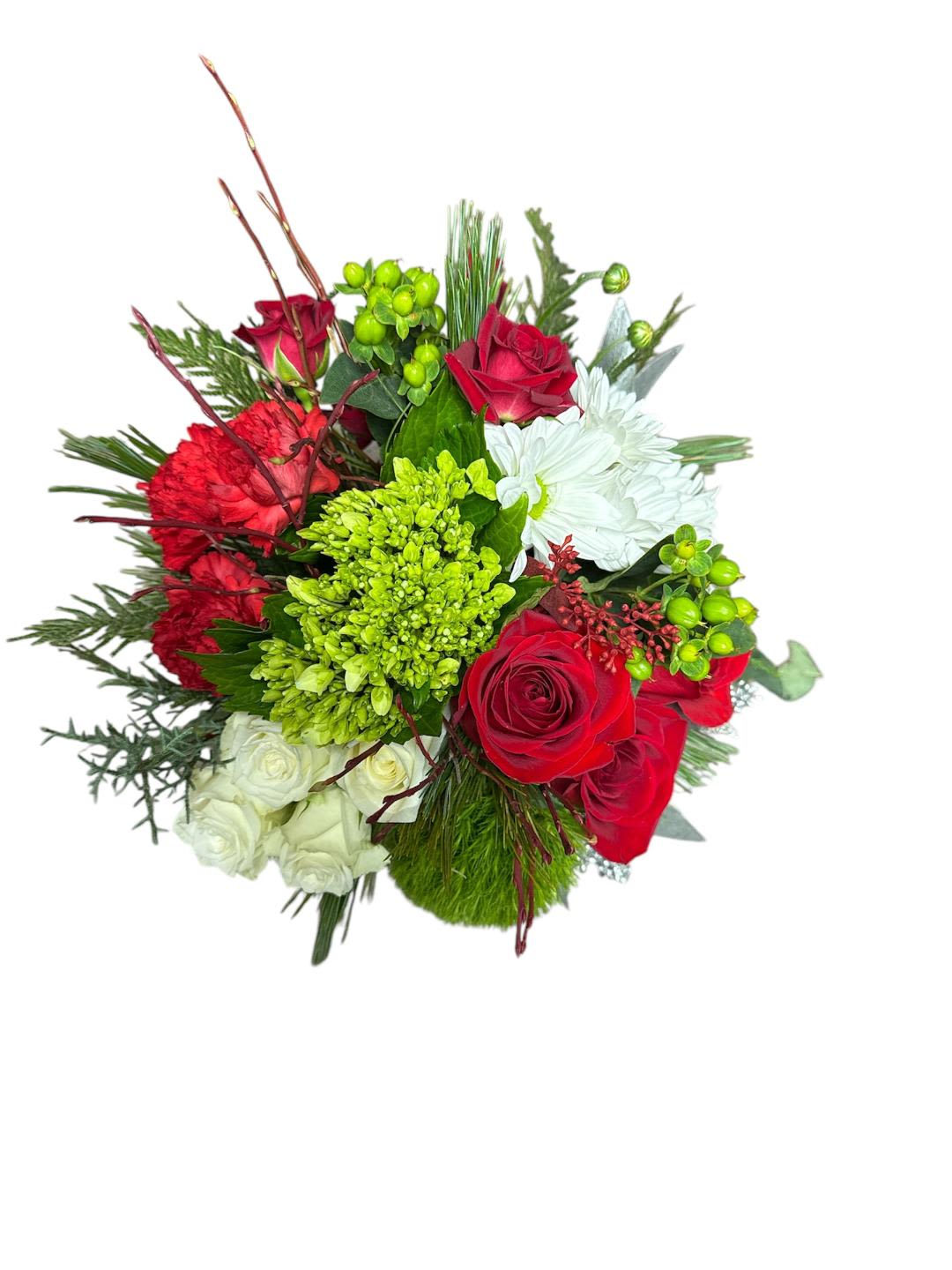Christmas Wishes 1025 Christmas Wishes 1025 - In some instances, our photo may represent an overall theme or look and include a one-of-a-kind vase which cannot be exactly replicated. Although the actual bouquet may not precisely match the photo, its temperament will. Occasionally, substitutions of flowers and/or containers happen due to weather, seasonality and market conditions which may affect availability. If this is the case with the gift you’ve selected, we will ensure that the style, theme and color scheme of your arrangement is preserved and will only substitute items of equal value or higher value. If any design elements are of major importance to your order, please include them in the florist instructions at checkout or contact us to ensure availability. Flower Care & Guarantee Policy We guarantee the freshness of our flowers for 24 hours from the time they leave our shop. Please note that because flowers are natural products, some blooms may open fully while others may not. This is a natural variation. To help your flowers last longer: For cut flowers: Trim the stems by 1 inch every 2–3 days and place them in fresh water. For arrangements in wet foam: Add 1 cup of water to the foam every couple of days to keep the flowers hydrated. After 24 hours from leaving the shop, it becomes the customer’s responsibility to care for the flowers properly. Thank you for your understanding and for choosing our shop!
