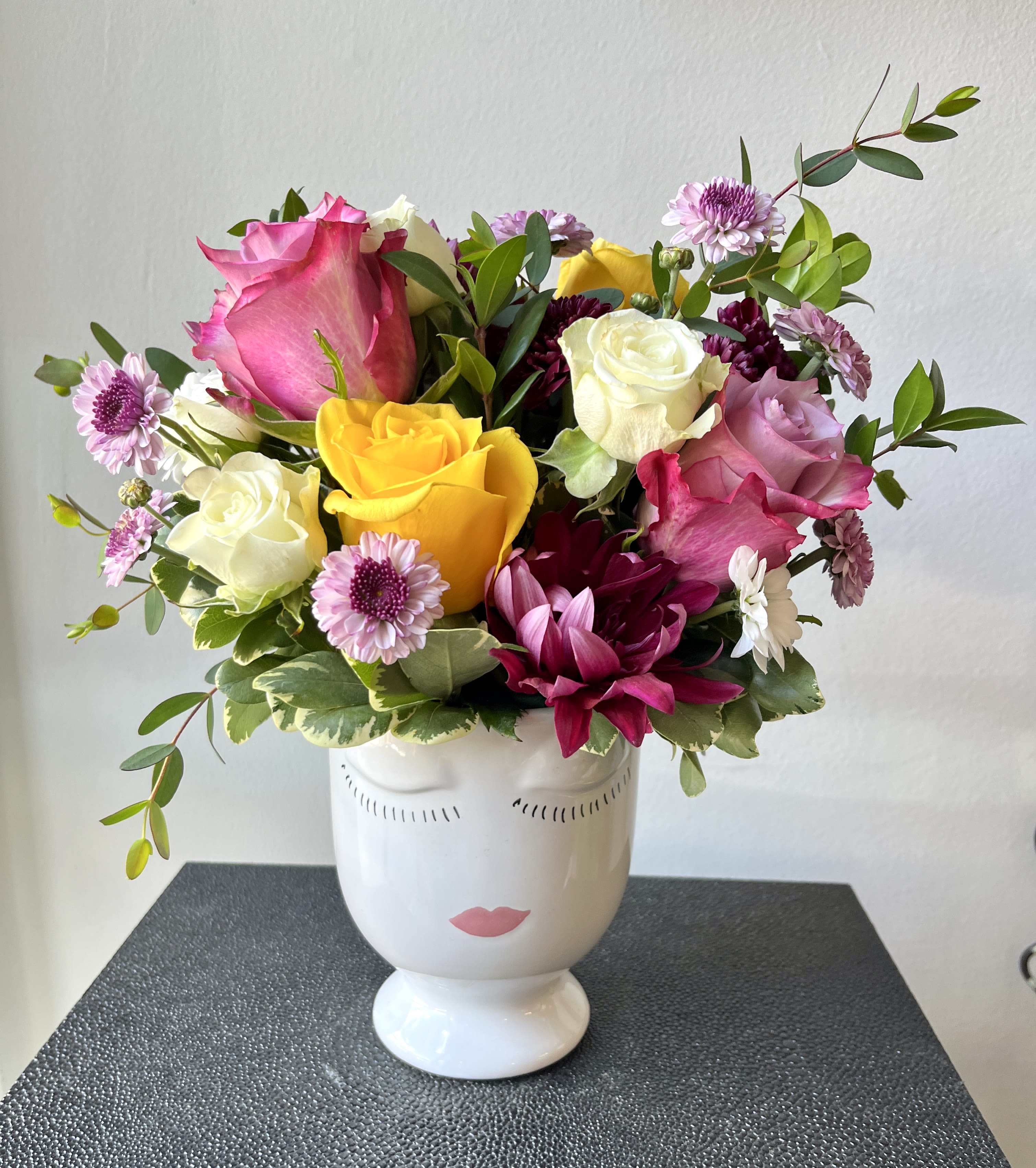 Lady Vase w/ Floral Head-Dress - Colors Vary with Season  - Face vase with floral accents available 2 sizes - flowers will vary with season.  