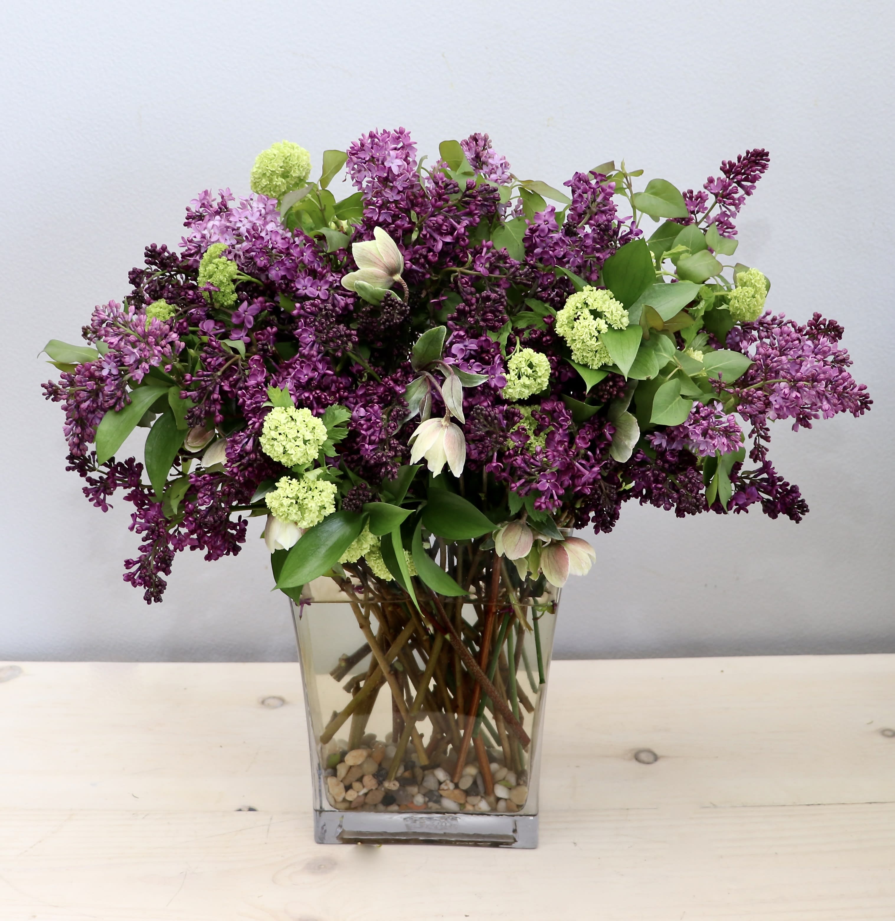 Lilac Special - West Hollywood Flowers Lilac Special - West Hollywood Flowers - For the month of April and May we are having a special on Lilacs! Make sure to get your arrangement before it runs out. It will make sure to fill up any room with that sweet smell of spring. It stands approximately 20'' tall and 16'' wide in our rectangular glass vase.