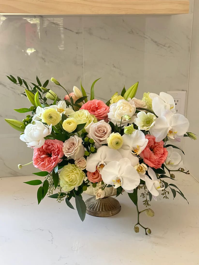 Enchanted Garden Enchanted Garden - "Transport yourself to an Enchanted Garden with our exotic floral arrangement featuring elegant orchids, stunning roses, peonies , and unique novelty blooms, crafted by our expert florists at Flower Lab. Order now for quick same-day flower delivery in Phoenix and bring the magic of the Enchanted Garden into your home or surprise someone special with this luxurious gift today. Pictured: Premium