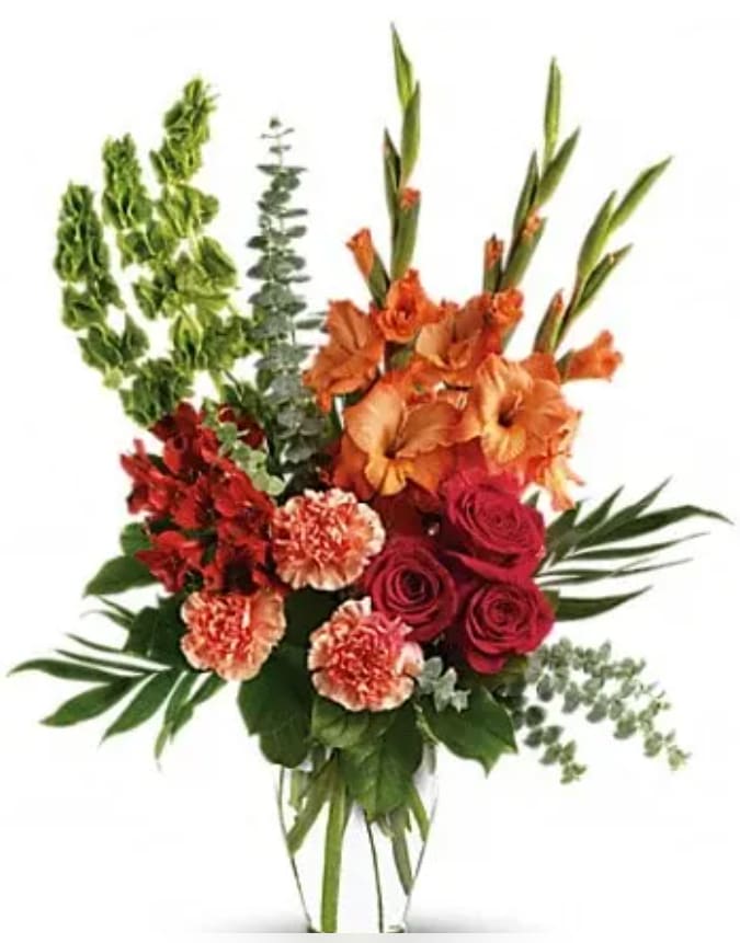 Days of Sunshine Bouquet Days of Sunshine Bouquet - Red roses, red alstroemeria and orange gladioli in a sparkling Ming urn - a lovely tribute that sends a message of hope and healing for those mourning their loss. The brilliant arrangement includes red roses, red alstroemeria, orange gladioli, orange carnations and bells of Ireland, accented with assorted greenery. Delivered in a clear glass Ming urn.