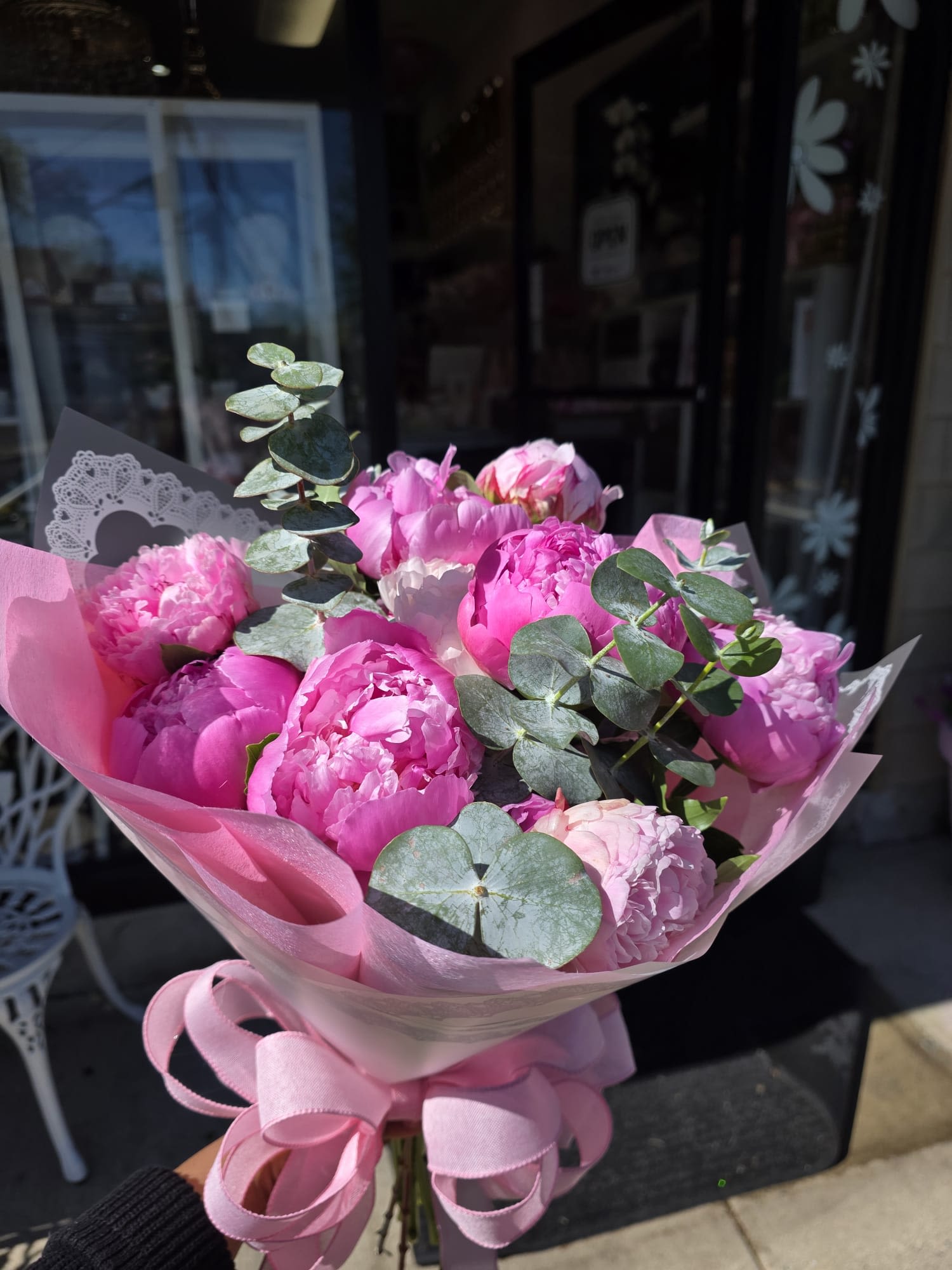Stacie’s Blushing Peony Splendor - An elegant bouquet of lush peonies, this arrangement bursts with soft, blushing hues and layers of delicate petals. Designed to captivate and charm, it embodies both classic beauty and modern sophistication—perfect for celebrations of love, romance, and life’s most cherished moments. The incorporation of Stacie’s signature style elevates this bouquet into a timeless, refined creation, making it a standout gift or centerpiece.