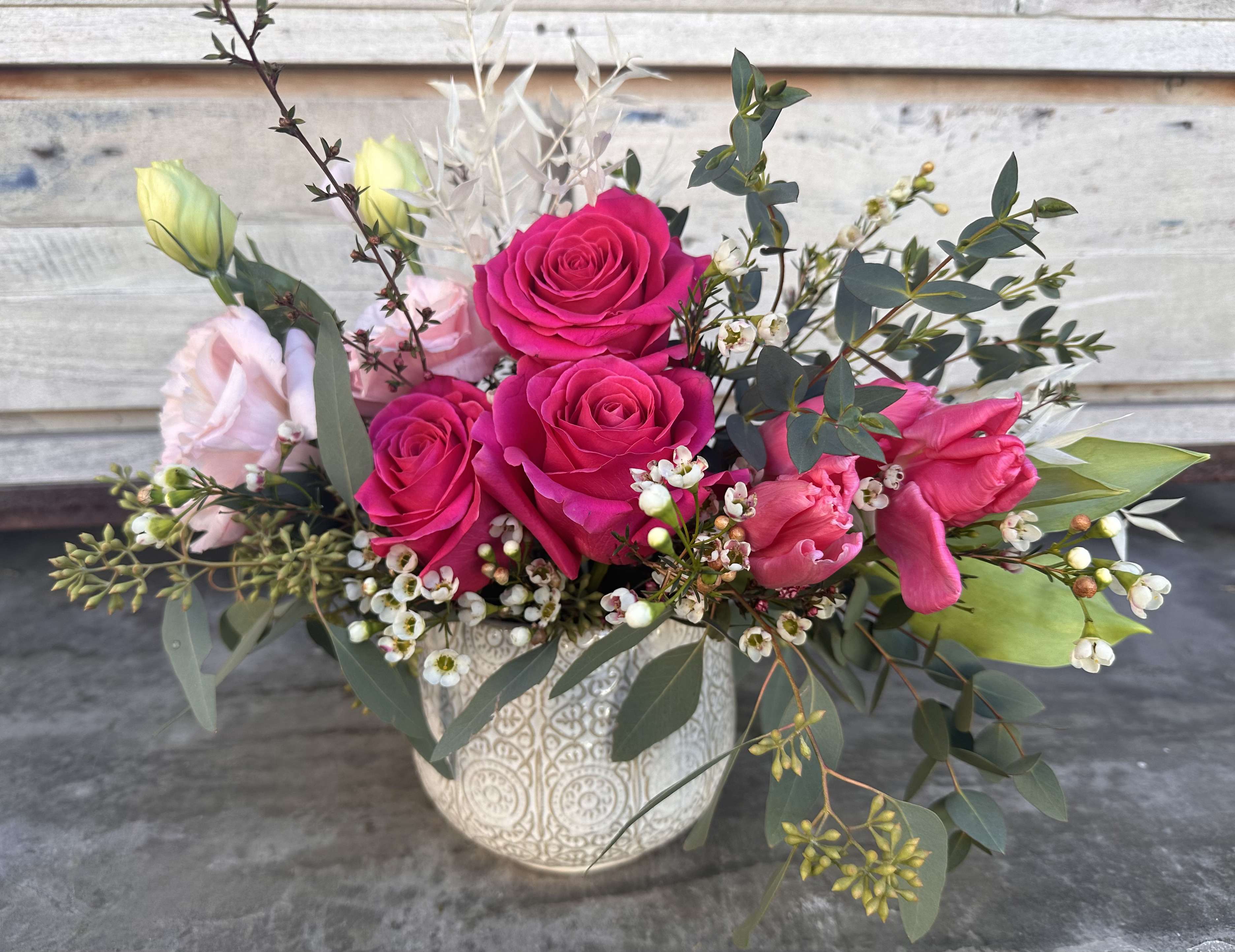 Boho Beauty Boho Beauty - Pretty pink tulips, hot pink roses, lissianthus & bleached ruskus fill this sweet printed bo ho pot