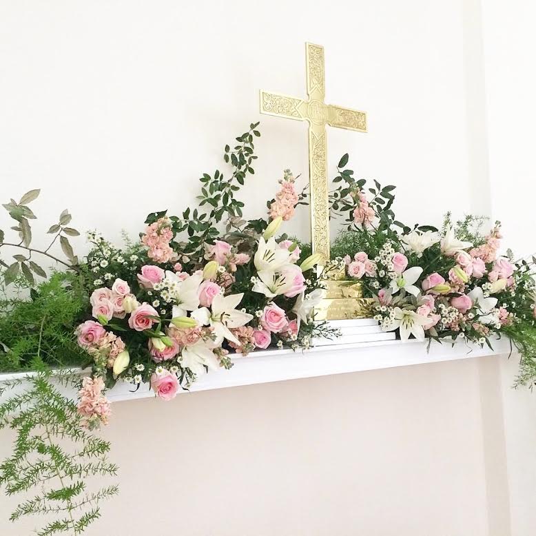 A La Carte Altar Ceremony Flowers - These beautiful altar flowers are shown in whites, greens, light pinks and blush but are available in the color palette of your choice with flowers complementing your bridal flowers. The price shown is for (1) side of the altar so to complete the look you would need to order two. If the altar flowers needed are for the center of the altar, please order one and specify center of the altar. Types of flowers will vary based on availability and the discretion of the designer. They can be delivered or picked up but not installed. They are created using oasis trays for easy transport and are great to repurpose for the reception or home.