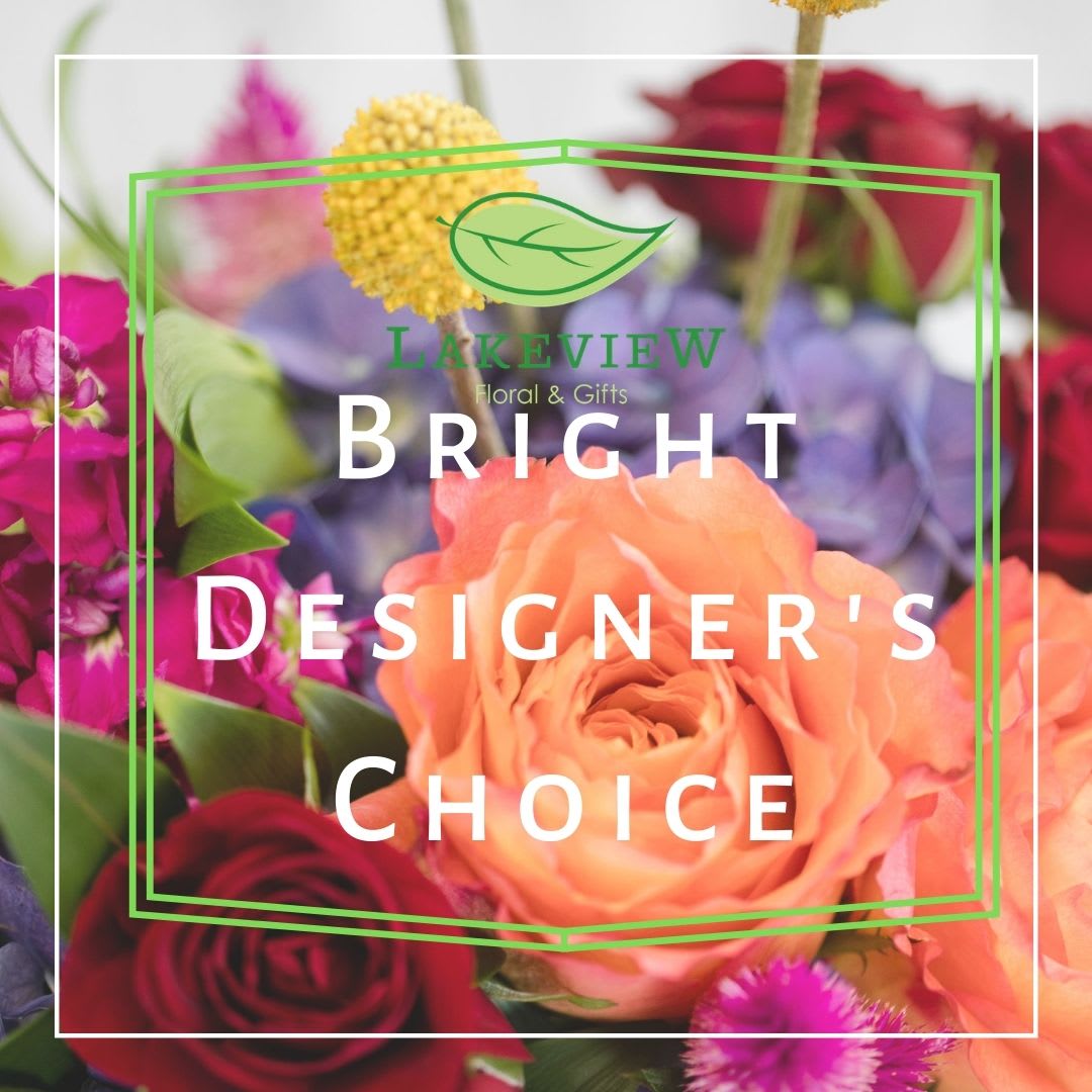 Bright Designer's Choice - Let our designers create a bright, vibrant arrangement that is one of a kind!  We will select the freshest, most beautiful blooms available to make sure your gift is extra special!  Standard: Petite Arrangement appropriate for a desk, coffee table or windowsill Deluxe: Moderate Arrangement appropriate for a kitchen table or island Premium: Premium blooms in a large size, sure to create a WOW factor!