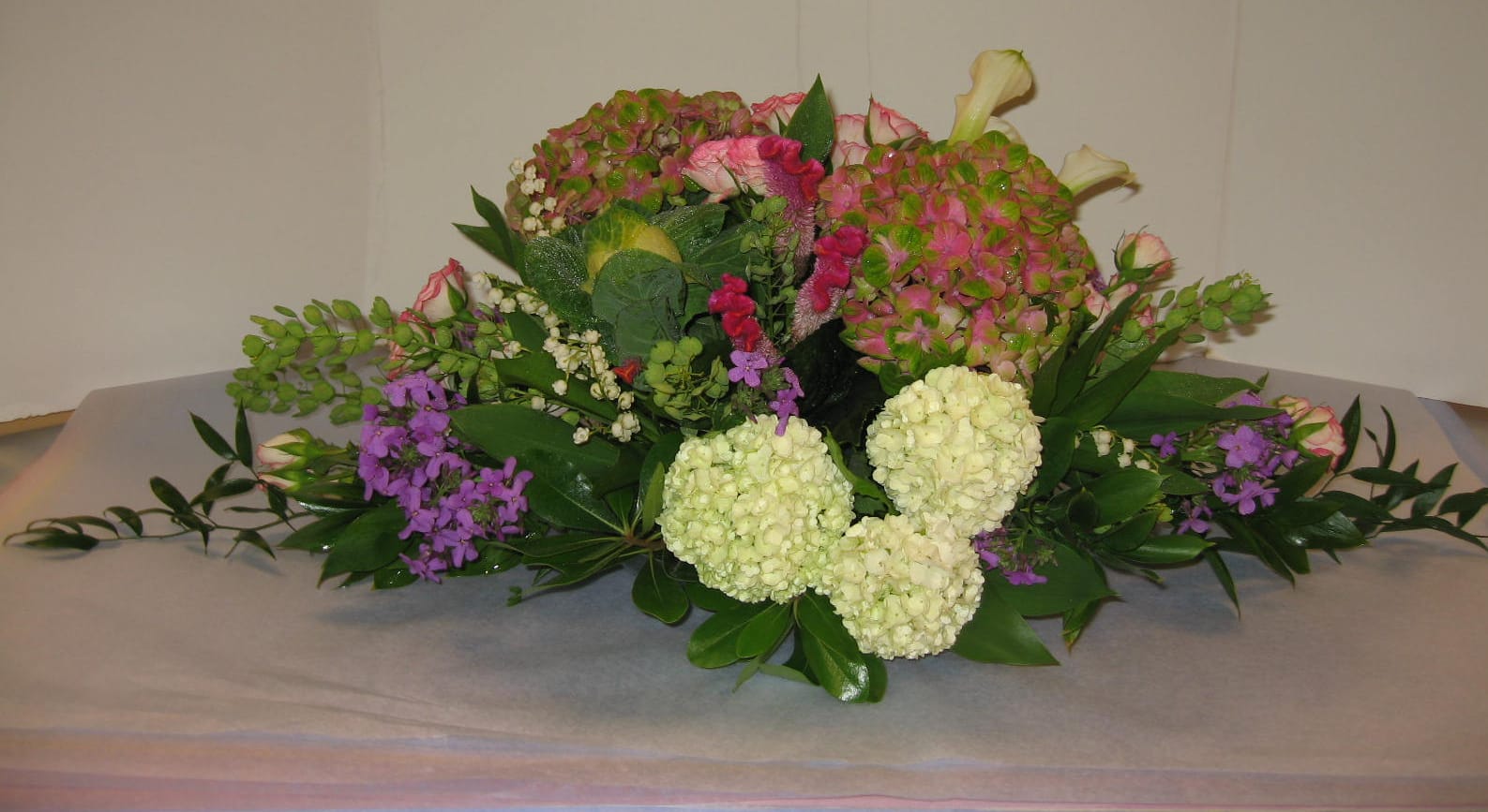Dinner Guest Long &amp; Low  Centerpiece( Pre-Order ) - (You Can Call Us  for your Choice of Flowers  and design. Novelty Hydrangea, Kale, Calla-Lilies, Snapdragons, Viburnum &amp; Fancy Greens