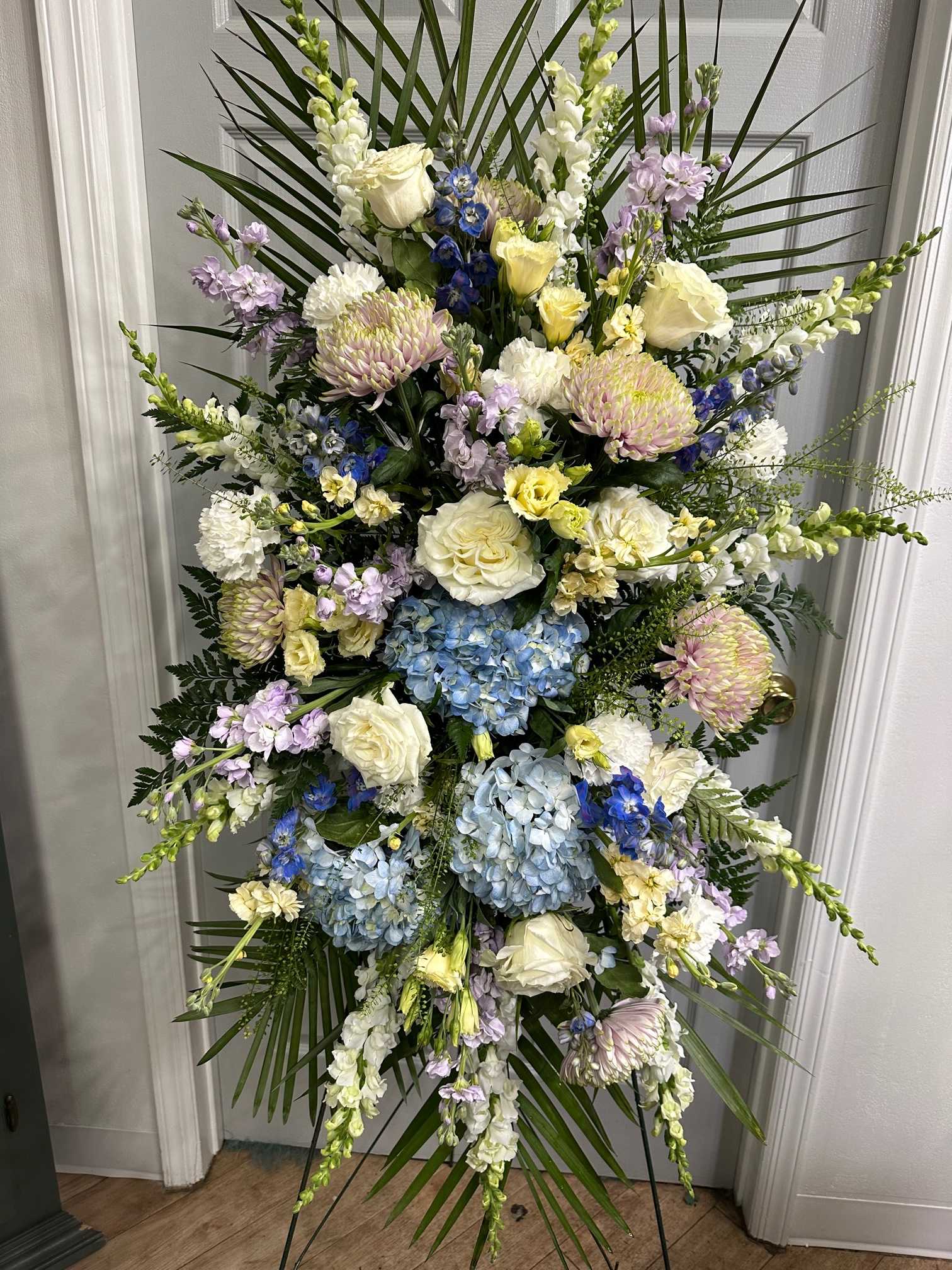 Garden Standing Spray Garden Standing Spray - Roses, Hydrangea, Assorted Cremons, Stock, Snapdragons, Assorted Fancy Greens