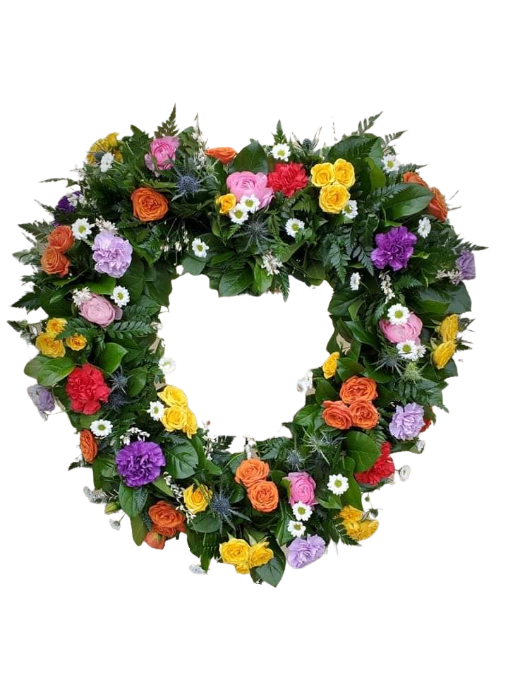 Rainbow of Love - A heart form designed with spray roses, carnations, daisies and other fresh flowers and filler. Comes with easil.  * Some stages of flower life may vary. (Example: Lilies may be more open than imaged.)  Flower shortages and product availability means that some substitutions will apply. Value will always be filled. This bouquet might include eucalyptus amongst the greenery. It may be toxic to pets including but not limited to Cats and Dogs if digested.