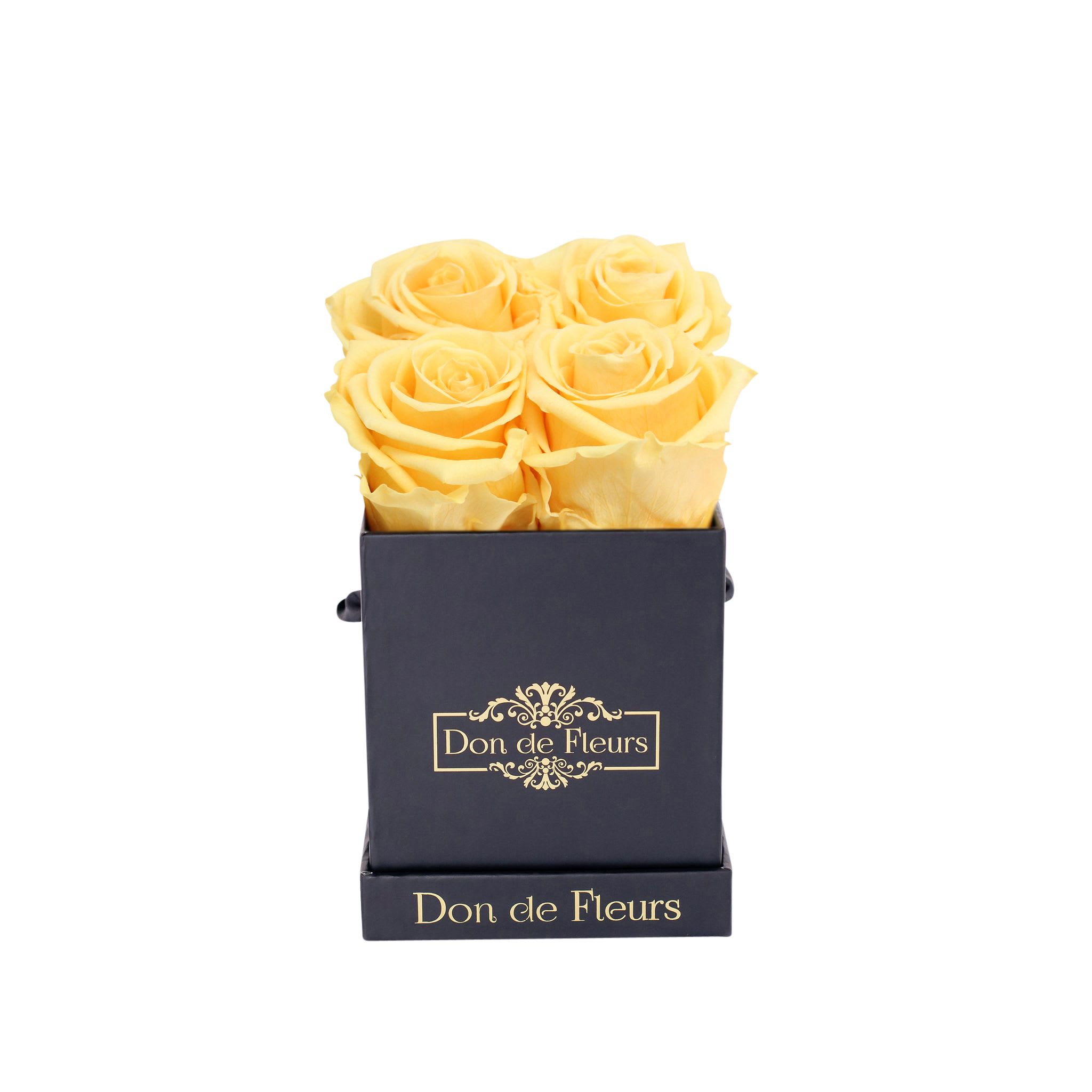 Petite Black Square Preserved Rose-Yellow - Rose Color: Yellow Rose Count: 4 Preserved Rose Lifespan: 1 Year+  Box Dimensions: 4&quot; x 4&quot; x 4.5&quot;  As Vincent Van Gogh said, “Great things are done by a series of small things brought together.” Our petite preserved box may be small but were designed for you to do something great and memorable, whether that is saying I love you, thank you, or just because I am thinking of you. Don’t let their sizes fool you, they are ever enduring in their beauty and impressions. The petite square forever roses box design was created to bring elegance, luxury, and simplicity.