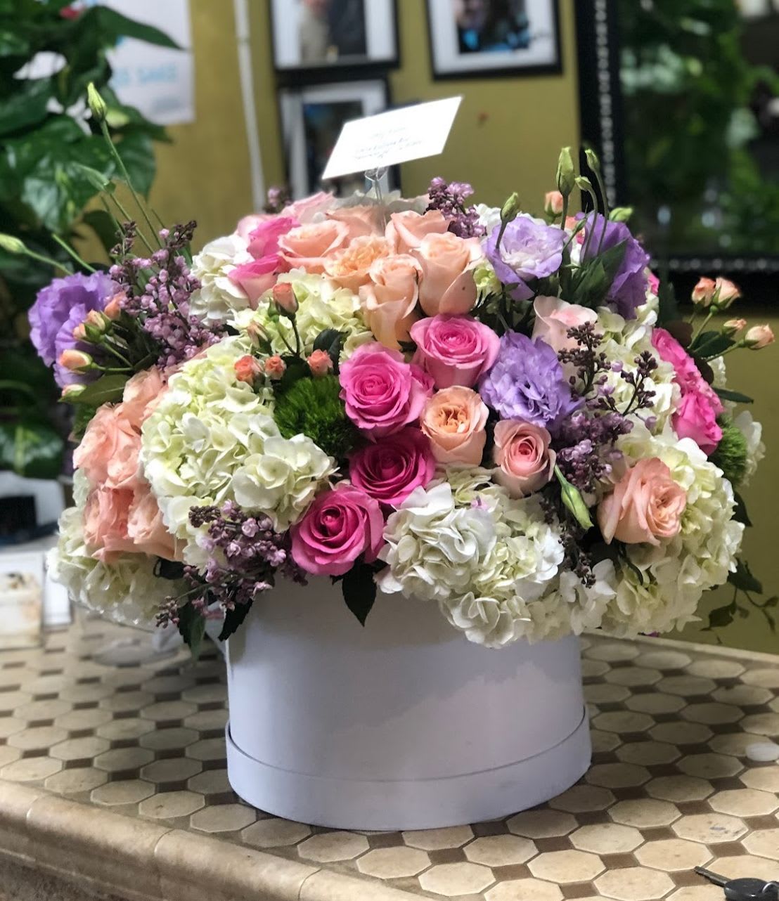 Swizerland in full bloom - This authentic box of pastel colors with a touch of European style of color combination, makes it a breath taking for her or any of your loved ones, roses, hydrangeas, touch of orchids and lilies, lavender lisiuntus and eucalyptus in a beautiful modern white box