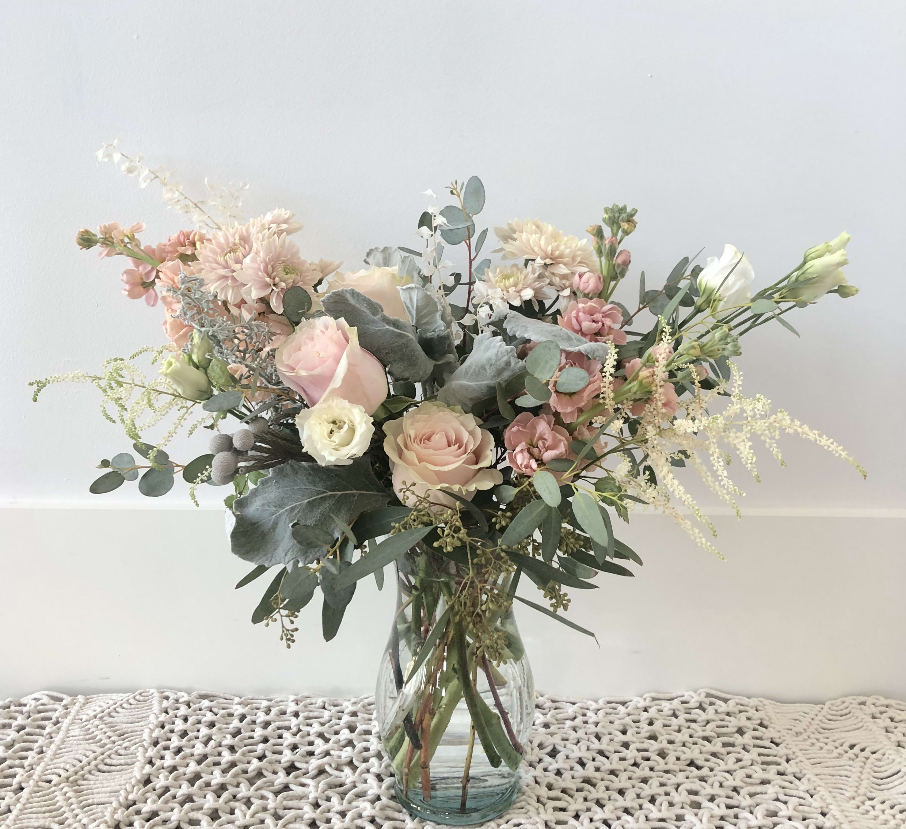 Pastel Pastel - A beautiful calm design with Roses, Lizianthis, Stock and in season flowers and foliage