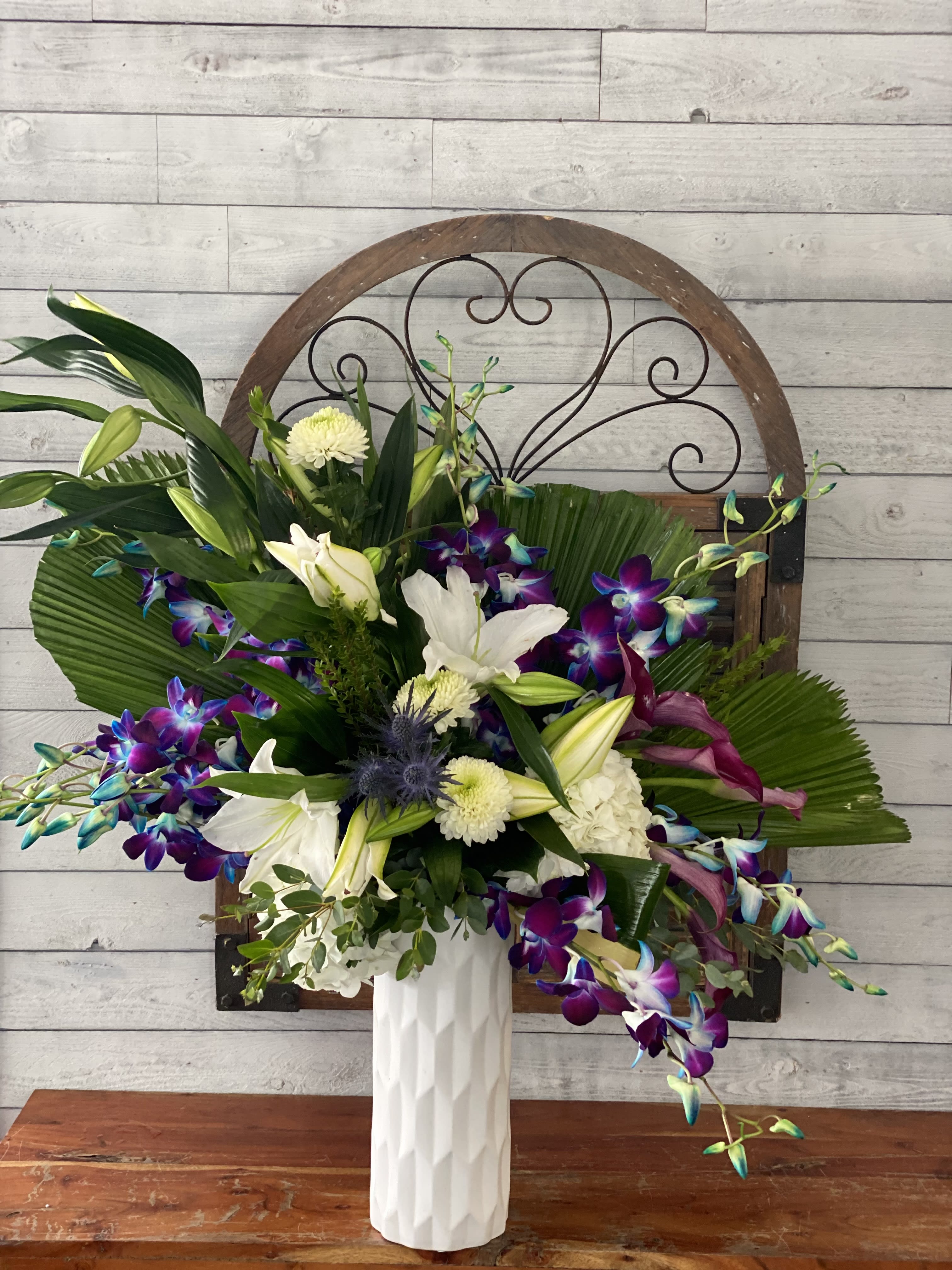 Blue Ocean waves  - Tropical White and Blue Arrangement in white ceramic vase. 